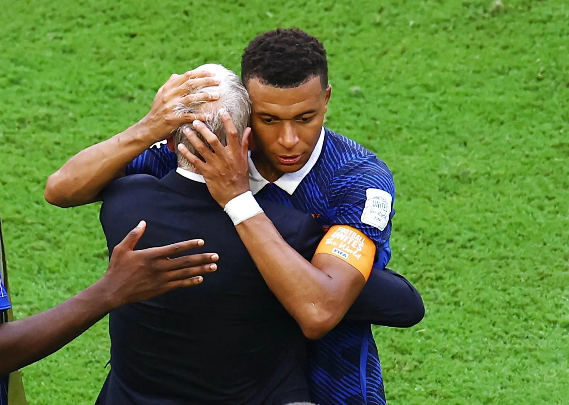 Didier Deschamps is embraced by Kylian Mbappé after his final game as France’s manager.