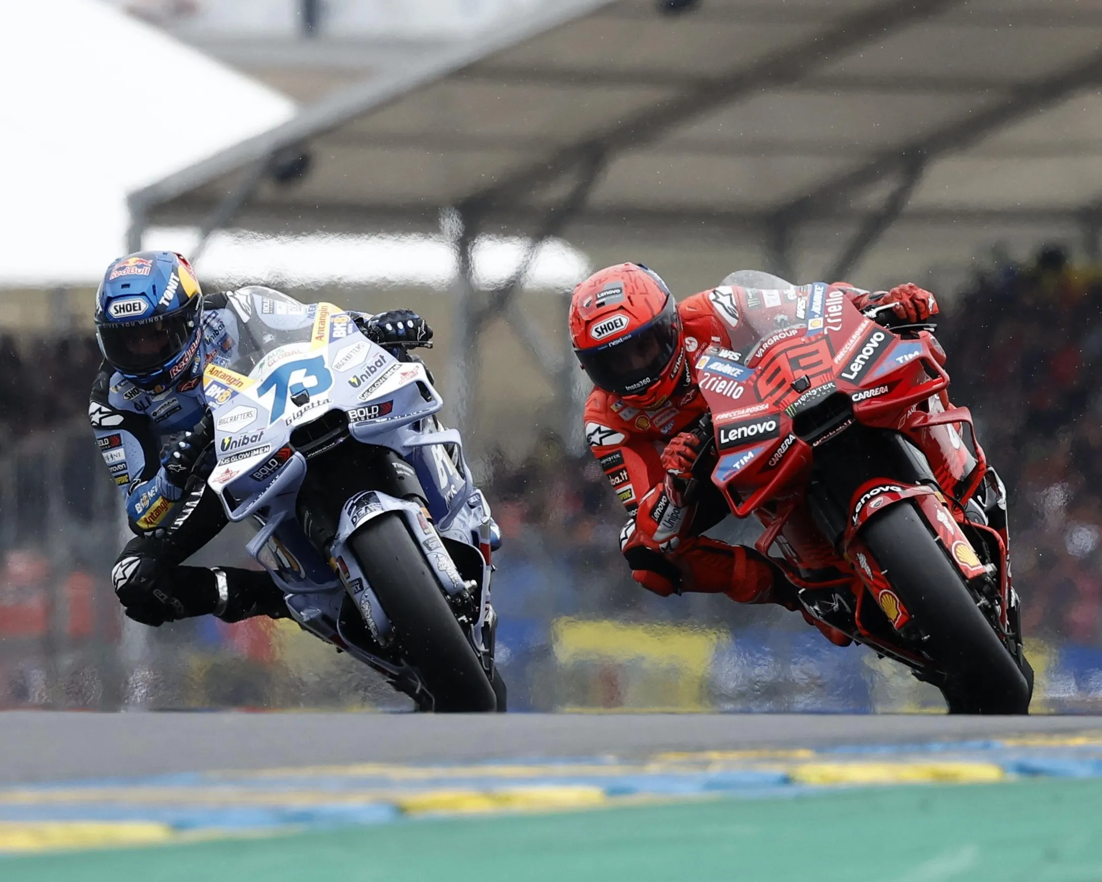 Marc Márquez (right) leads his brother Álex Márquez in the riders’ standings after Álex crashed at Le Mans