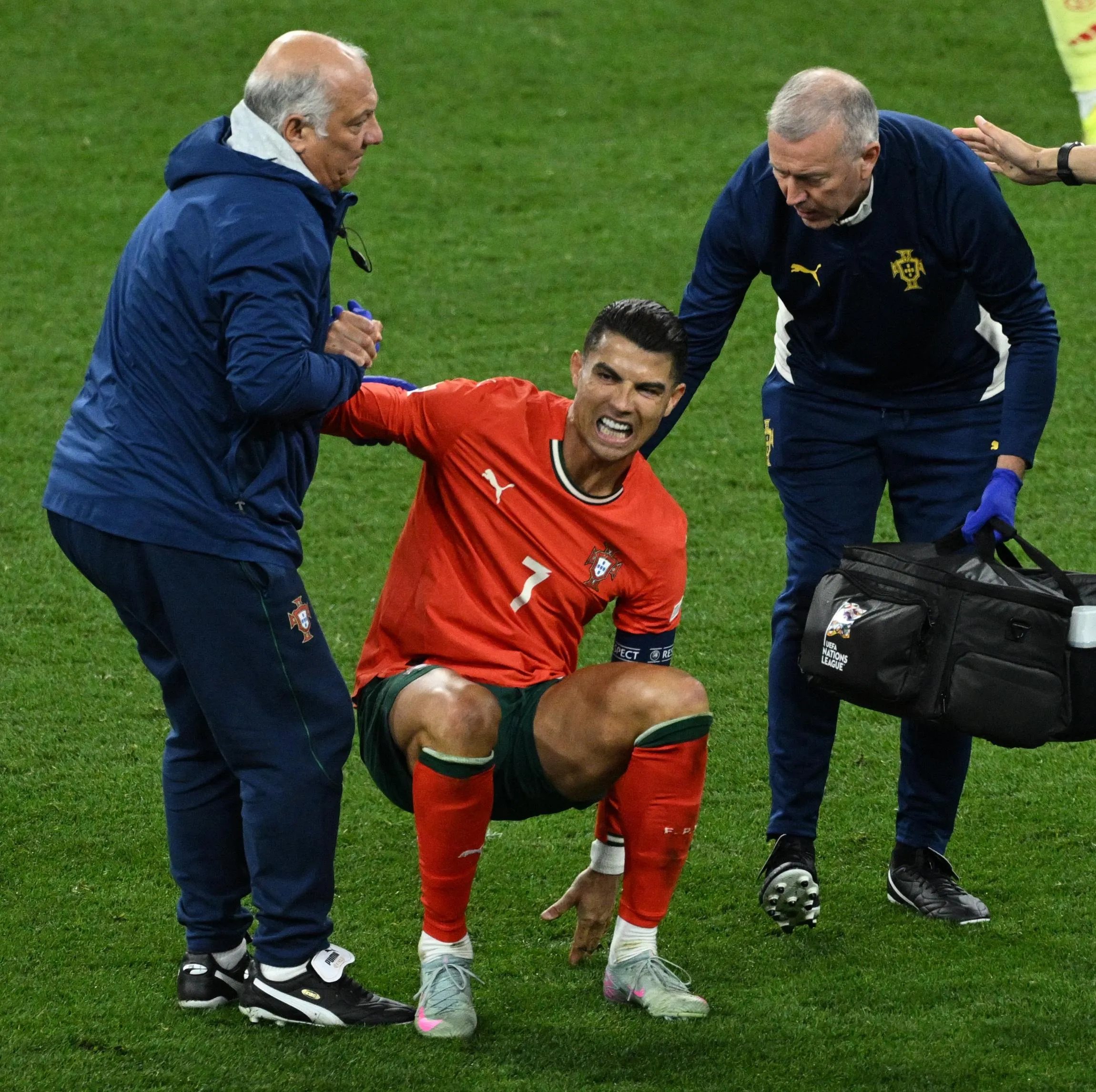Ronaldo receives medical attention before going off.