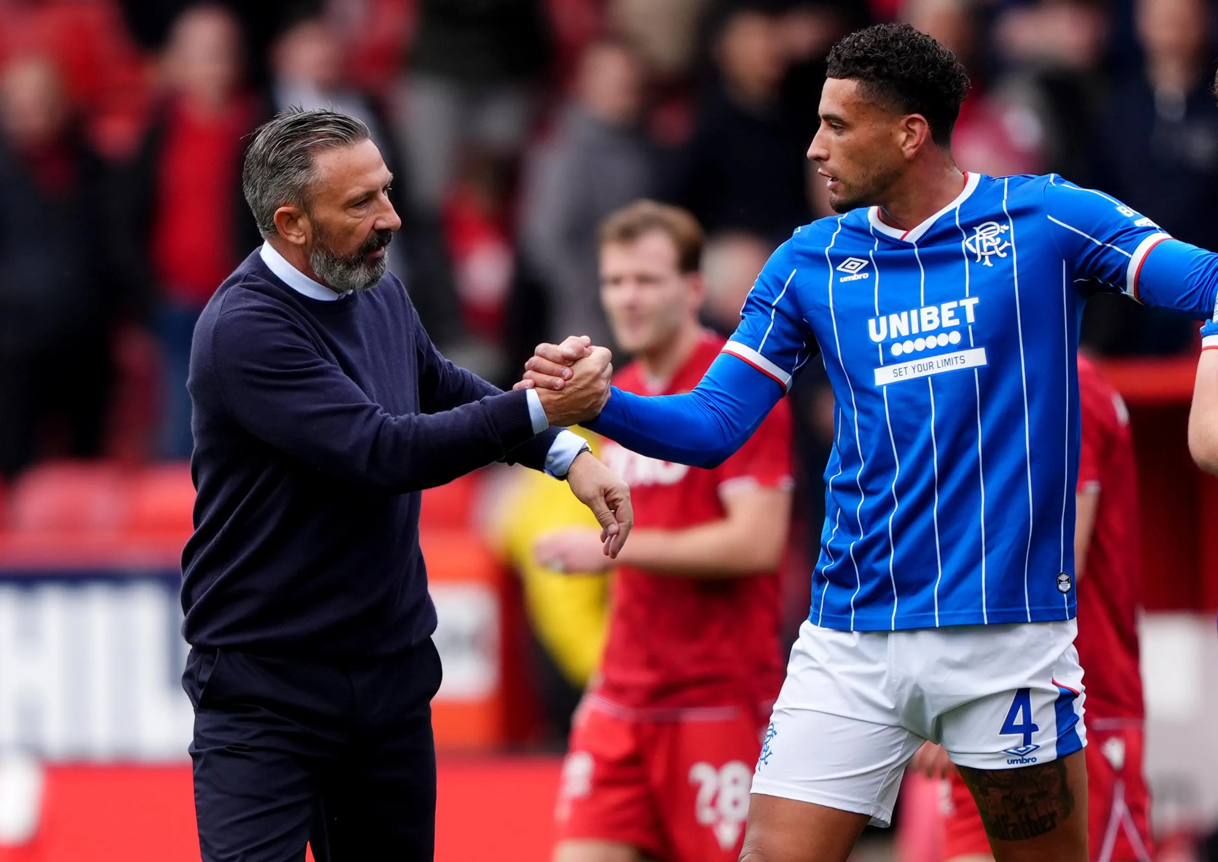 Derek McInnes congratulates Ben Godfrey