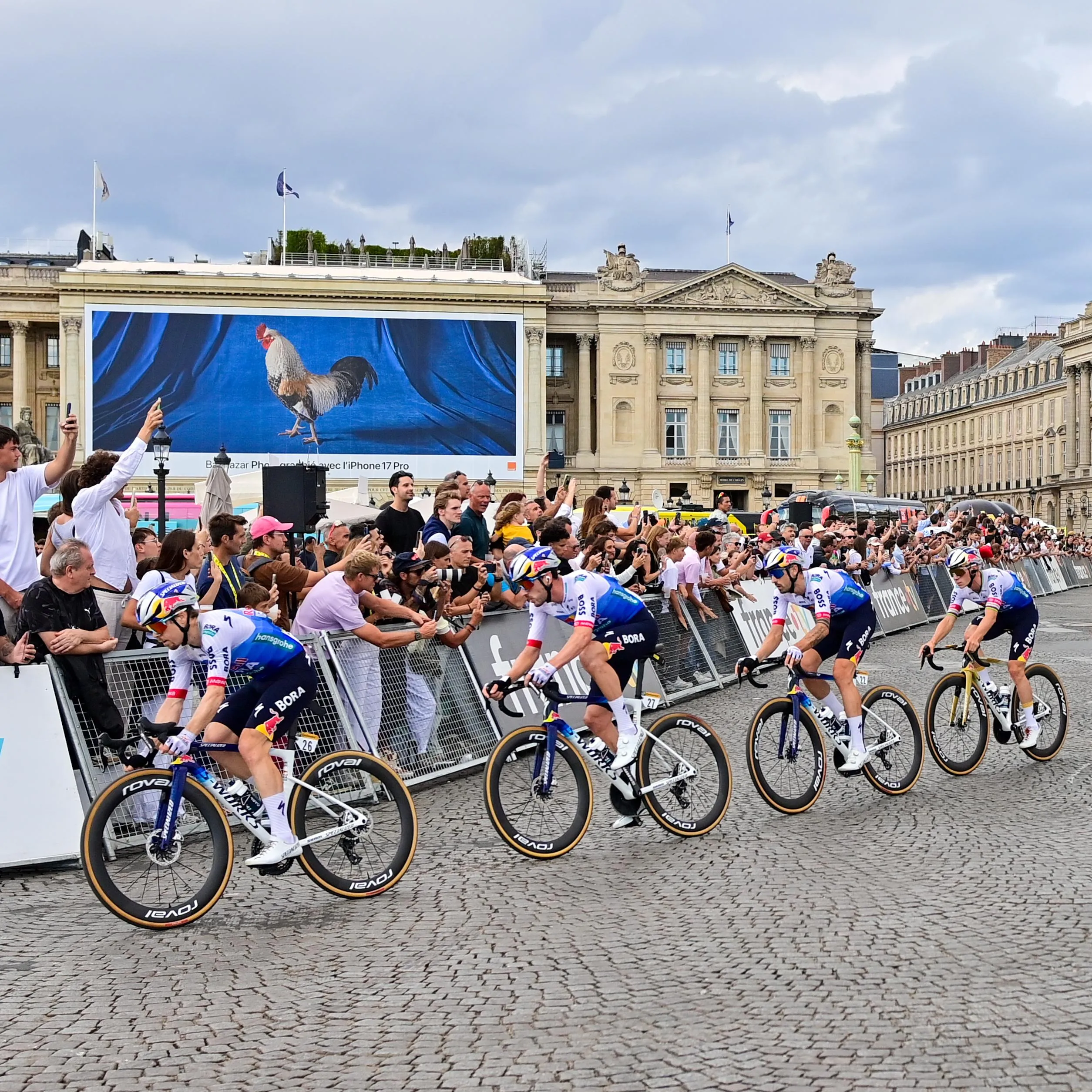 The peloton race round the streets of Paris.