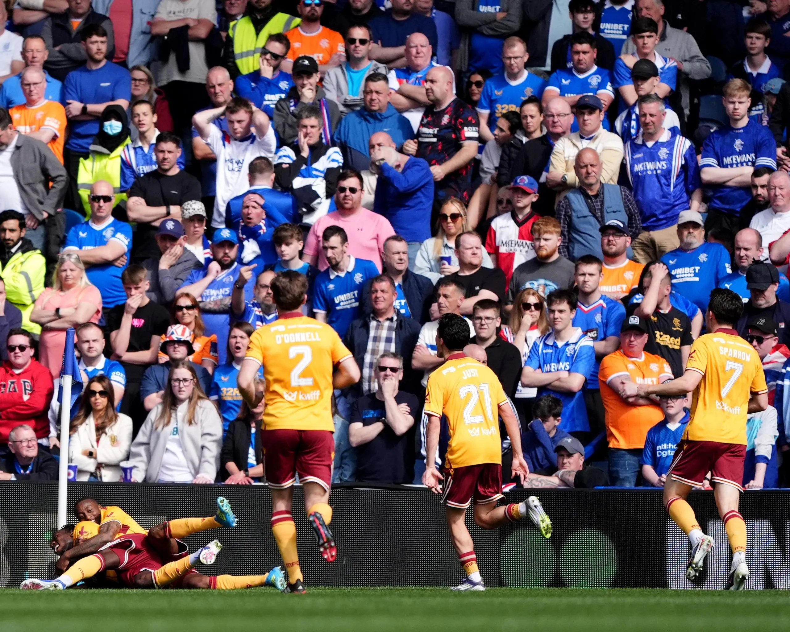 Motherwell celebrate a goal at Ibrox.