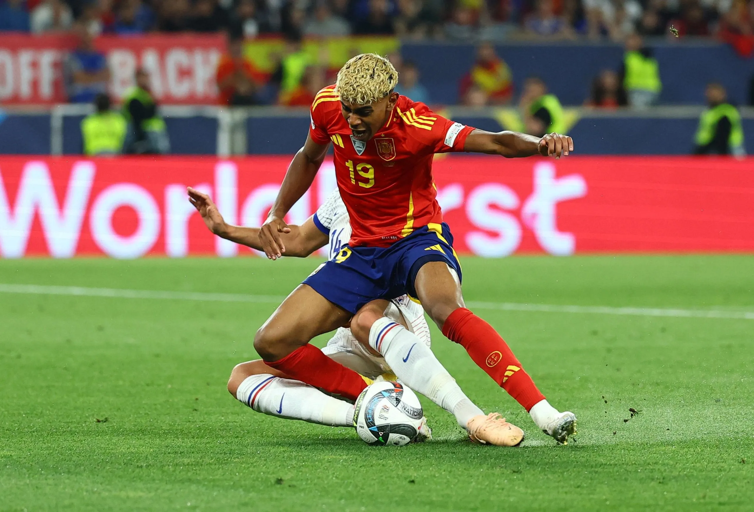Adrien Rabiot concedes a penalty against Spain's Lamine Yamal