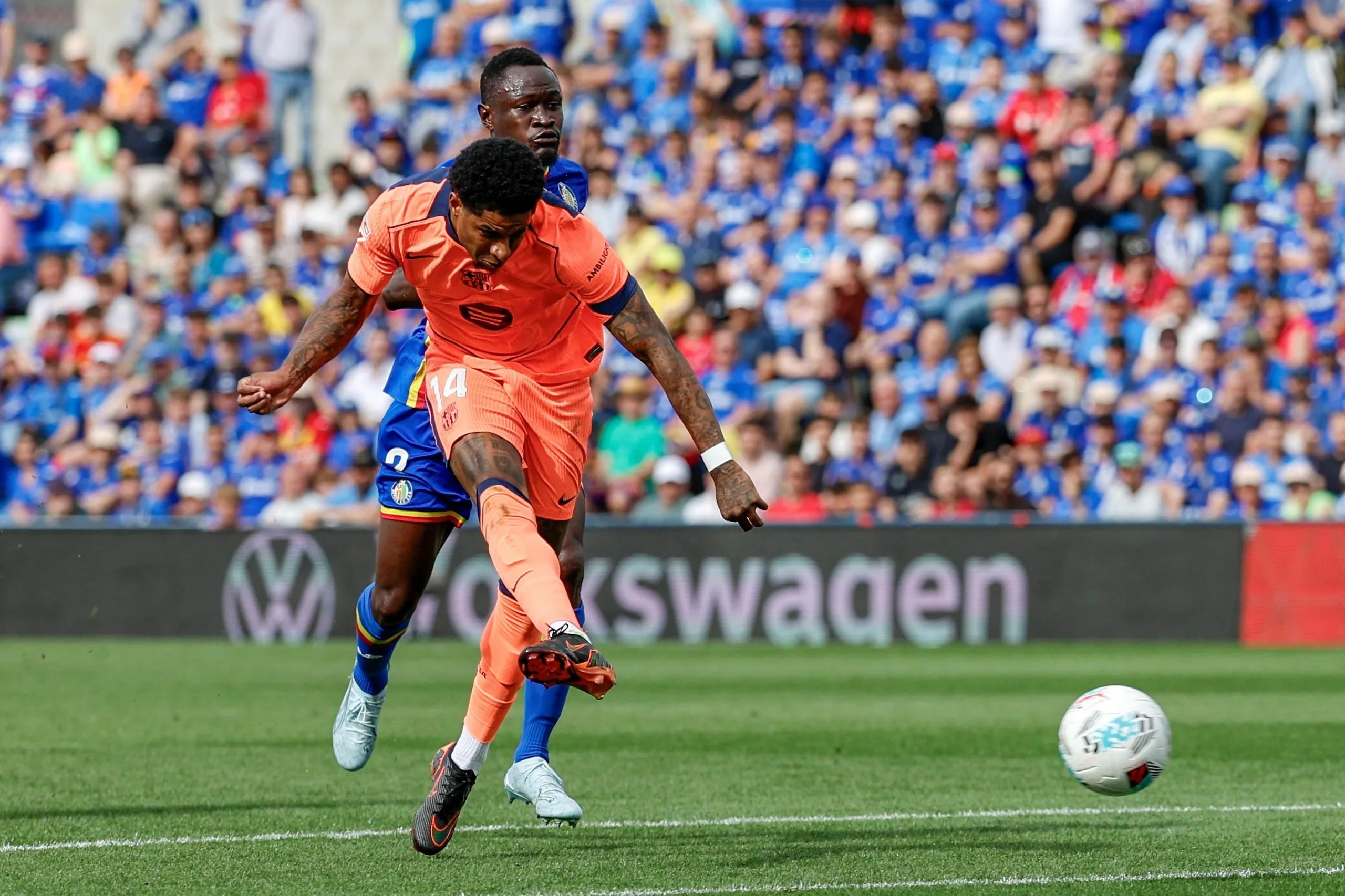 Marcus Rashford shoots from the edge of the penalty area, with an opposition defender chasing him in vain, to score Barcelona’s second goal in their 2-0 win at Getafe in La Liga.