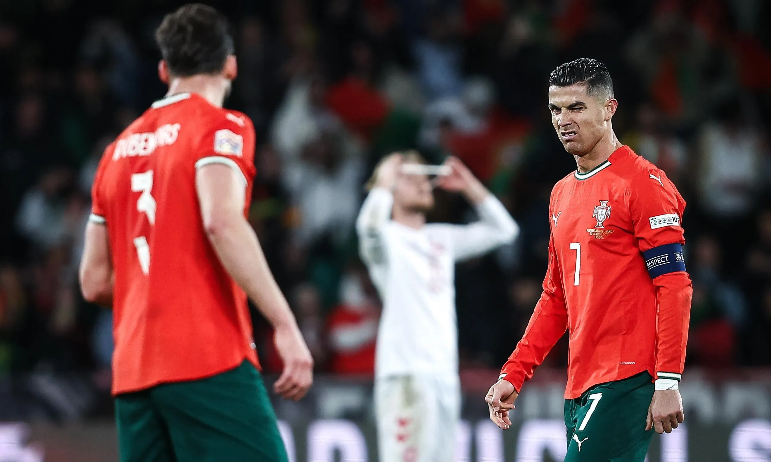 Portugal's Cristiano Ronaldo (R) celebrates scoring a goal