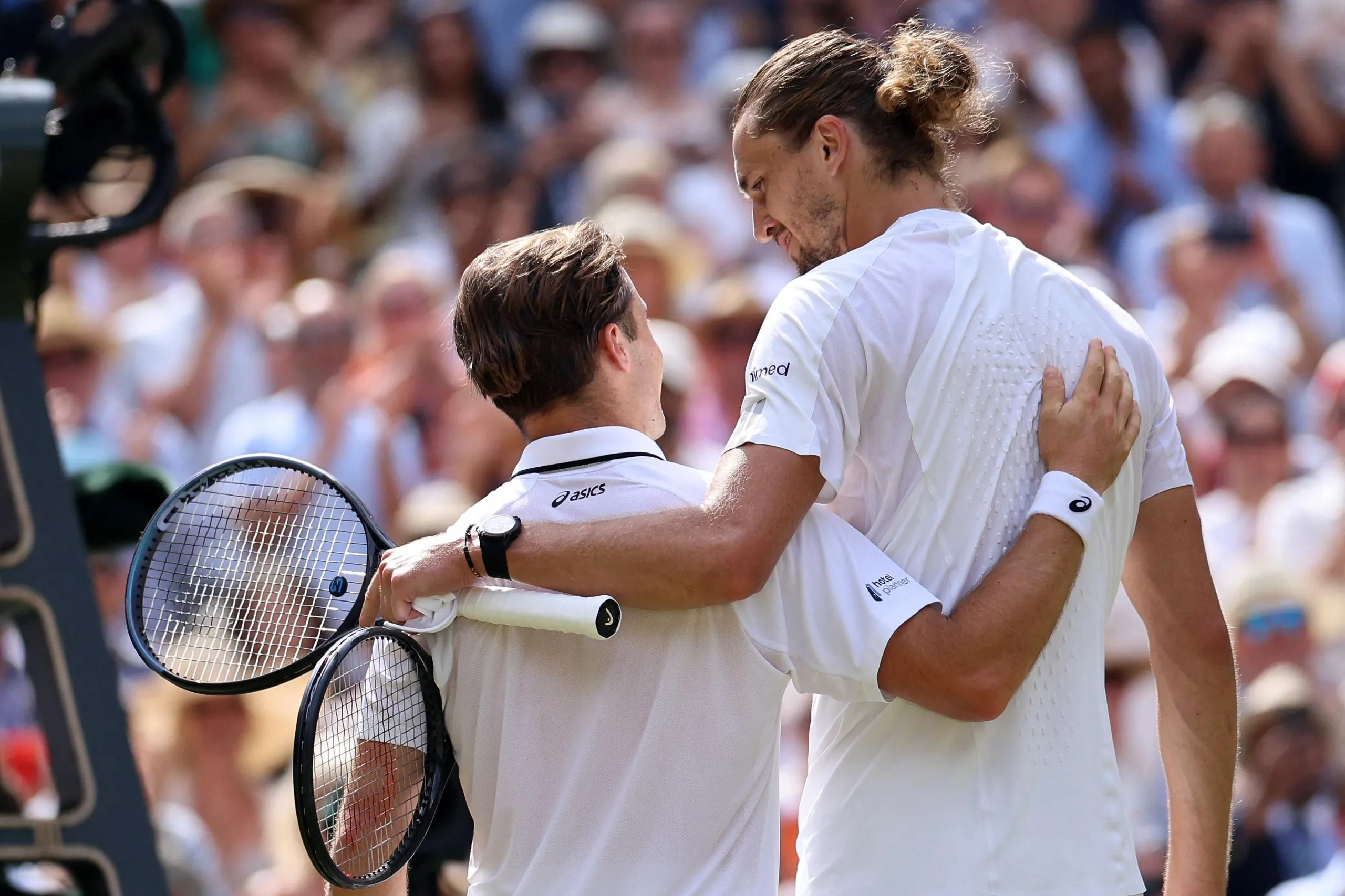 Arthur Fery is embraced Alexander Zverev after the German’s semi-final victory at Wimbledon