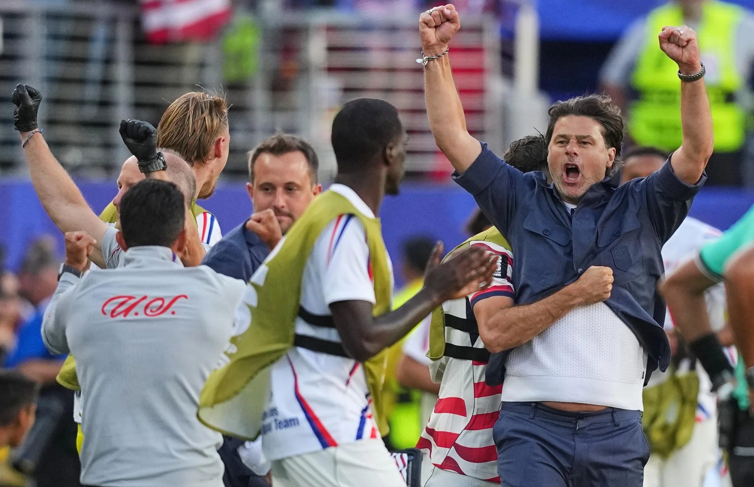 United States head coach Mauricio Pochettino celebrates with his players following the World Cup round of 32 soccer match between the United States and Bosnia in Santa Clara, Calif., near San Francisco, Wednesday, July 1, 2026.