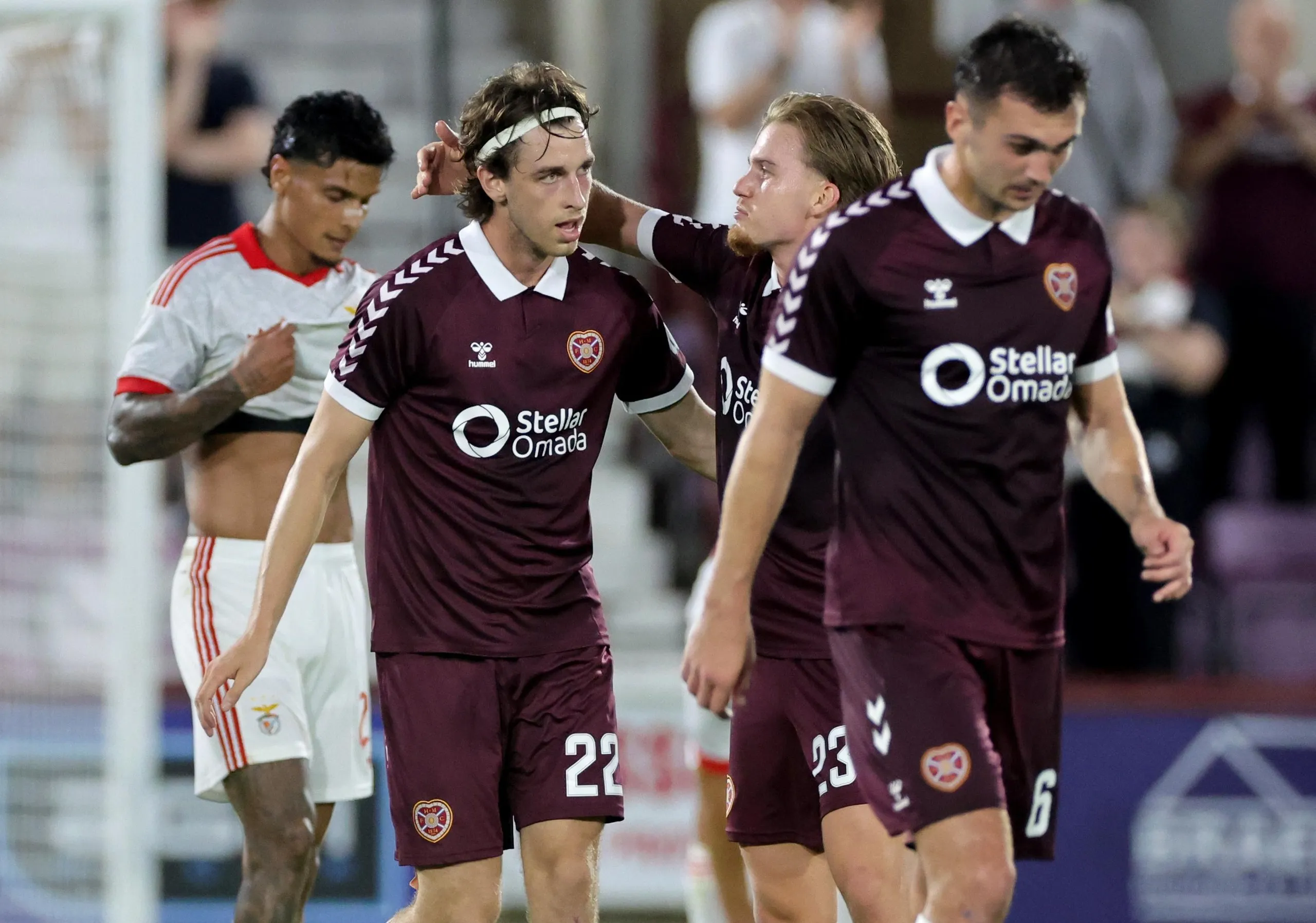 Tómas Magnússon (left) is congratulated by his teammates after scoring for Hearts against Benfica