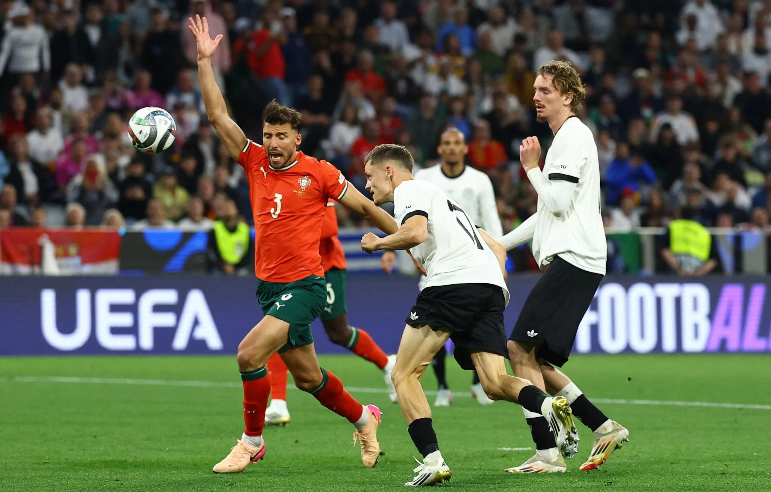 Germany’s Florian Wirtz heads home to open the scoring in the Nations League semi-final against Portugal.