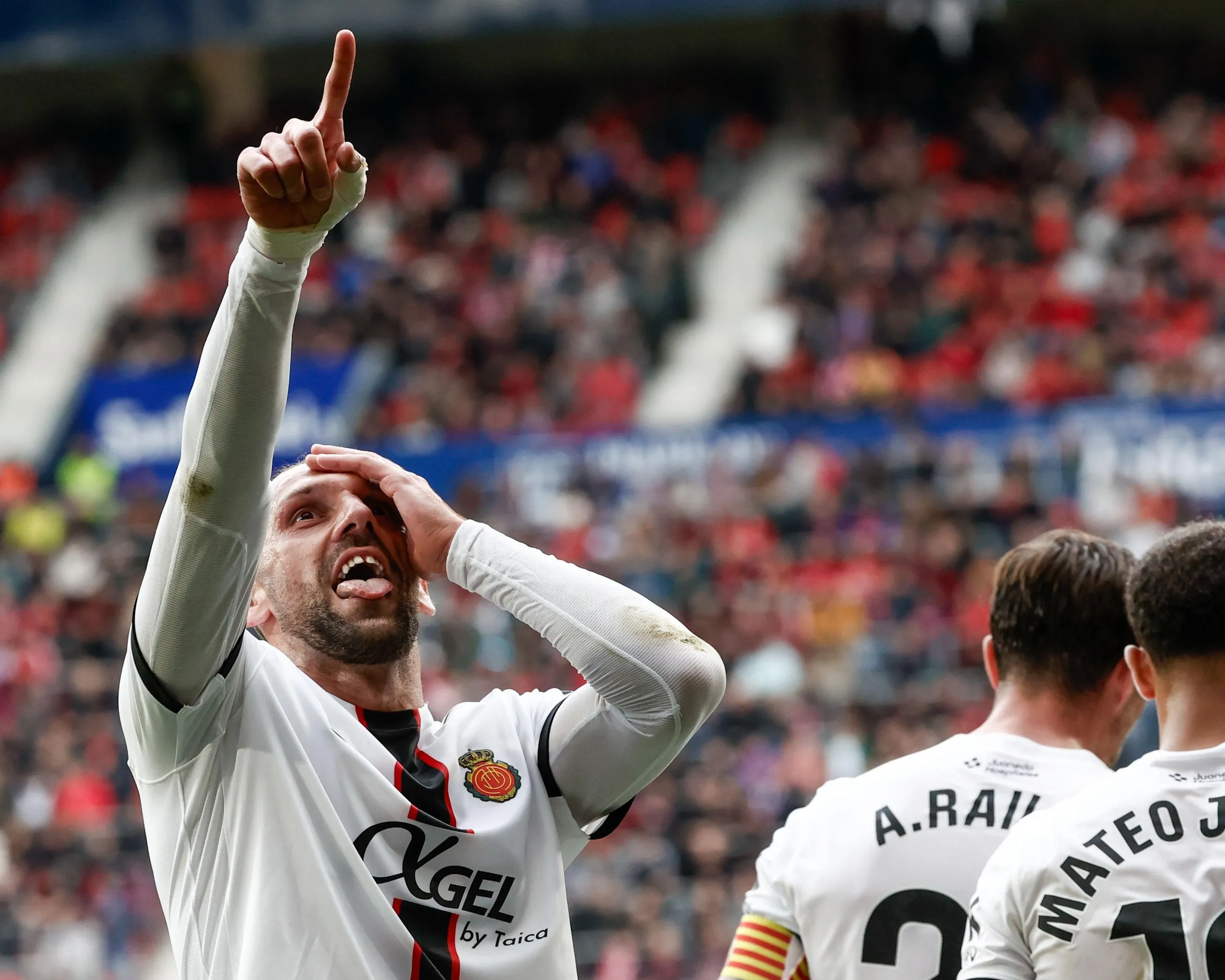 Vedat Muriqi celebrates after scoring