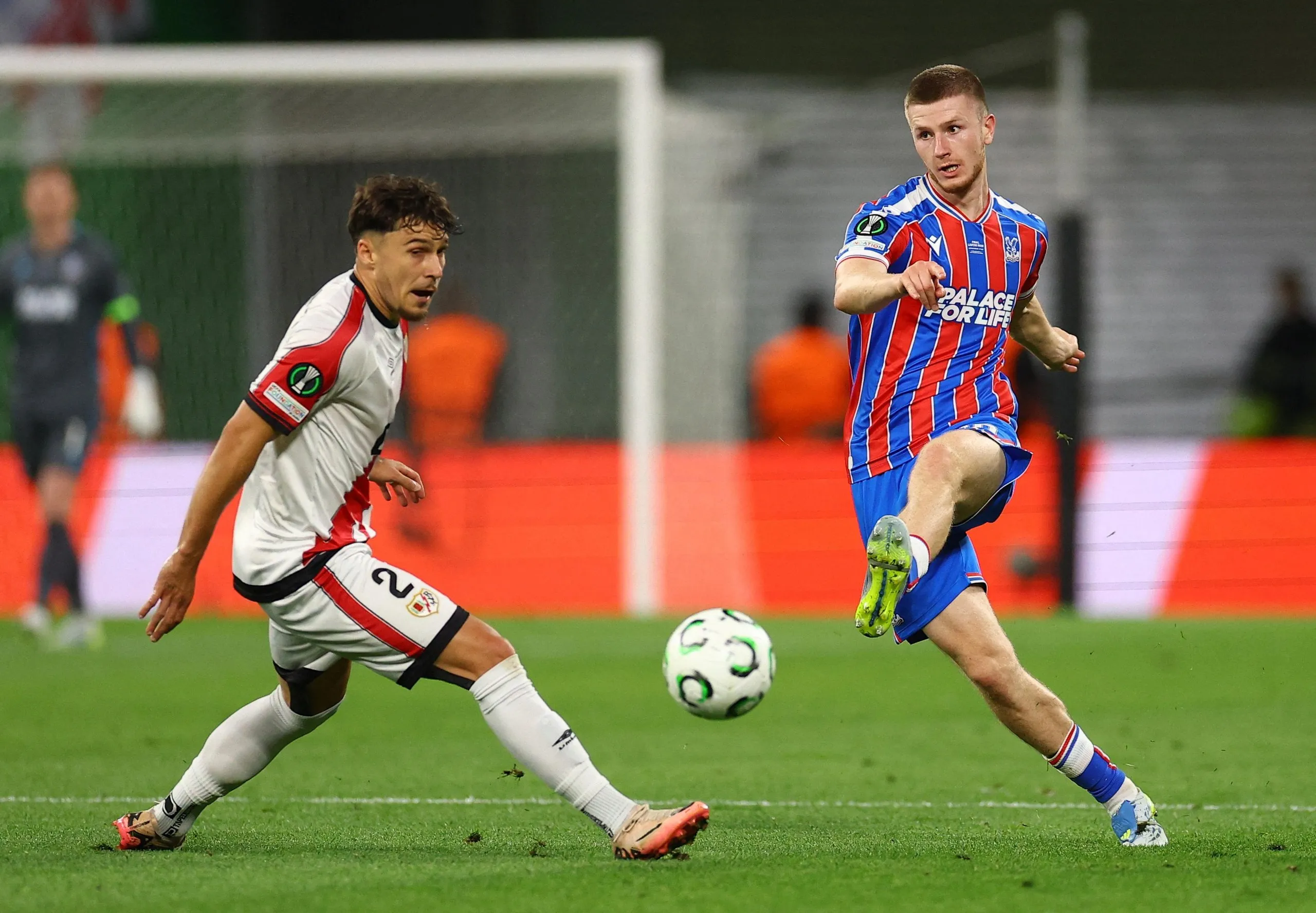 Adam Wharton passes the ball.