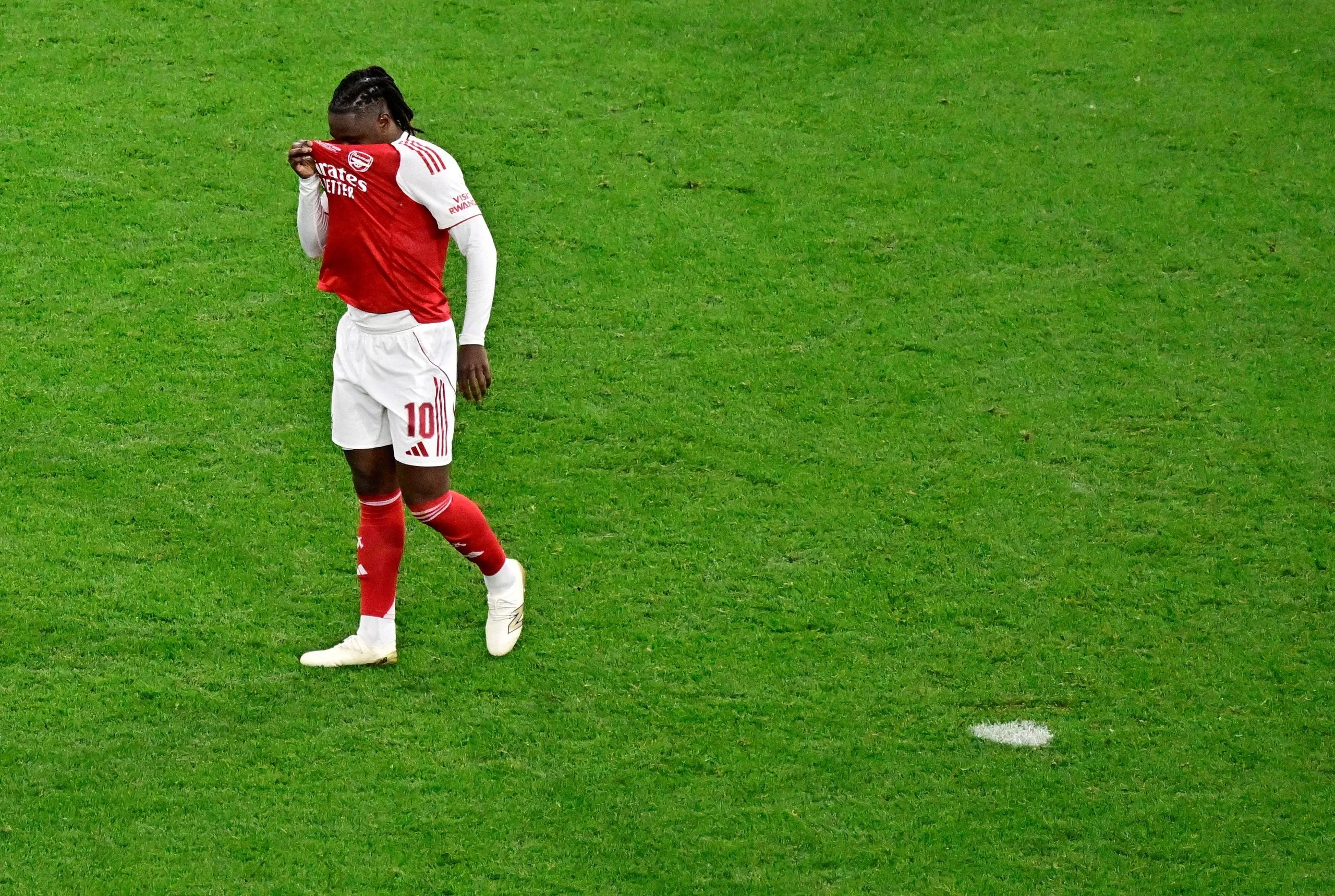 Arsenal's Eberechi Eze looks dejected after missing a penalty during the penalty shoot-out.