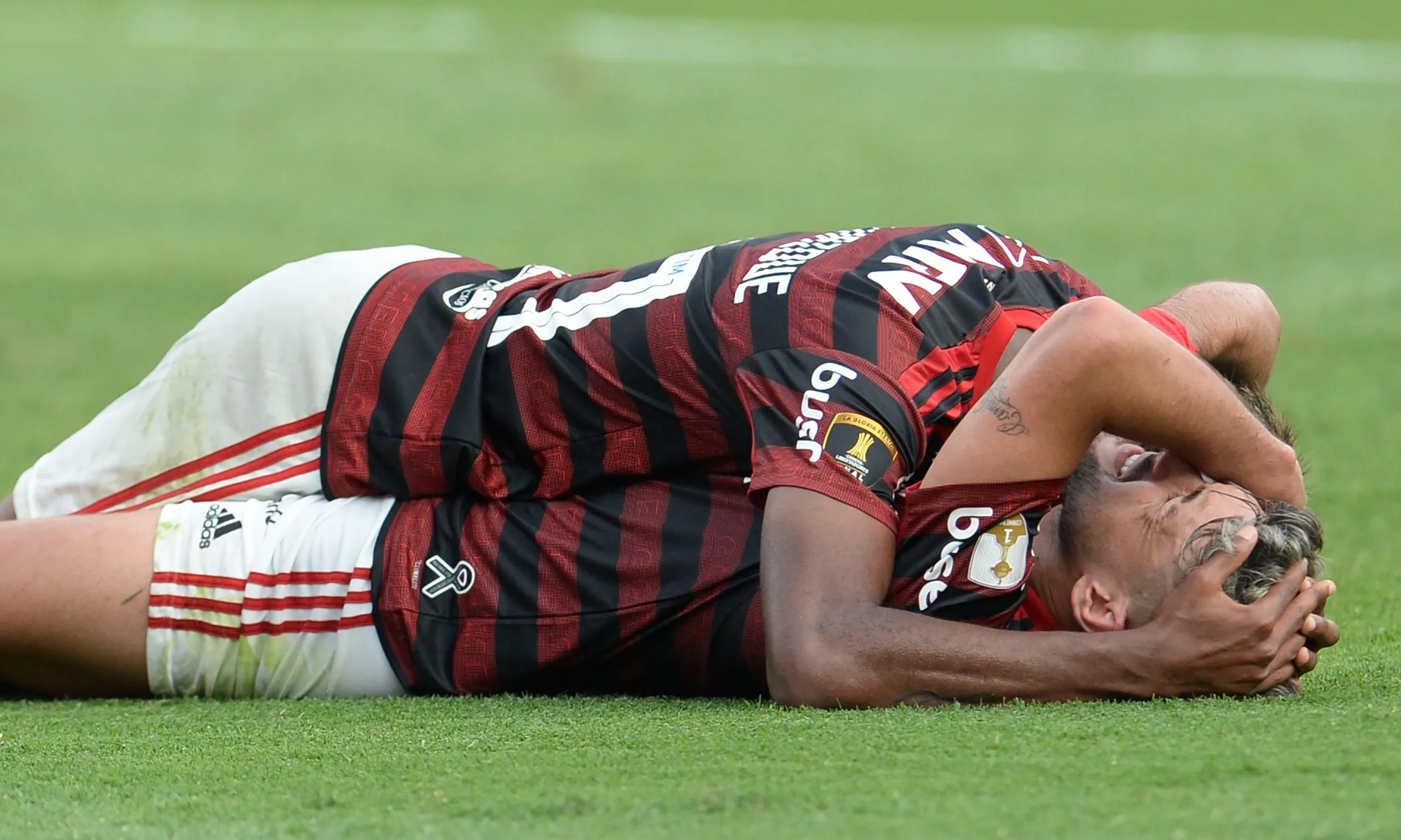 Flamengo’s Gabriel Barbosa is congratulated by a teammate after scoring their equaliser.