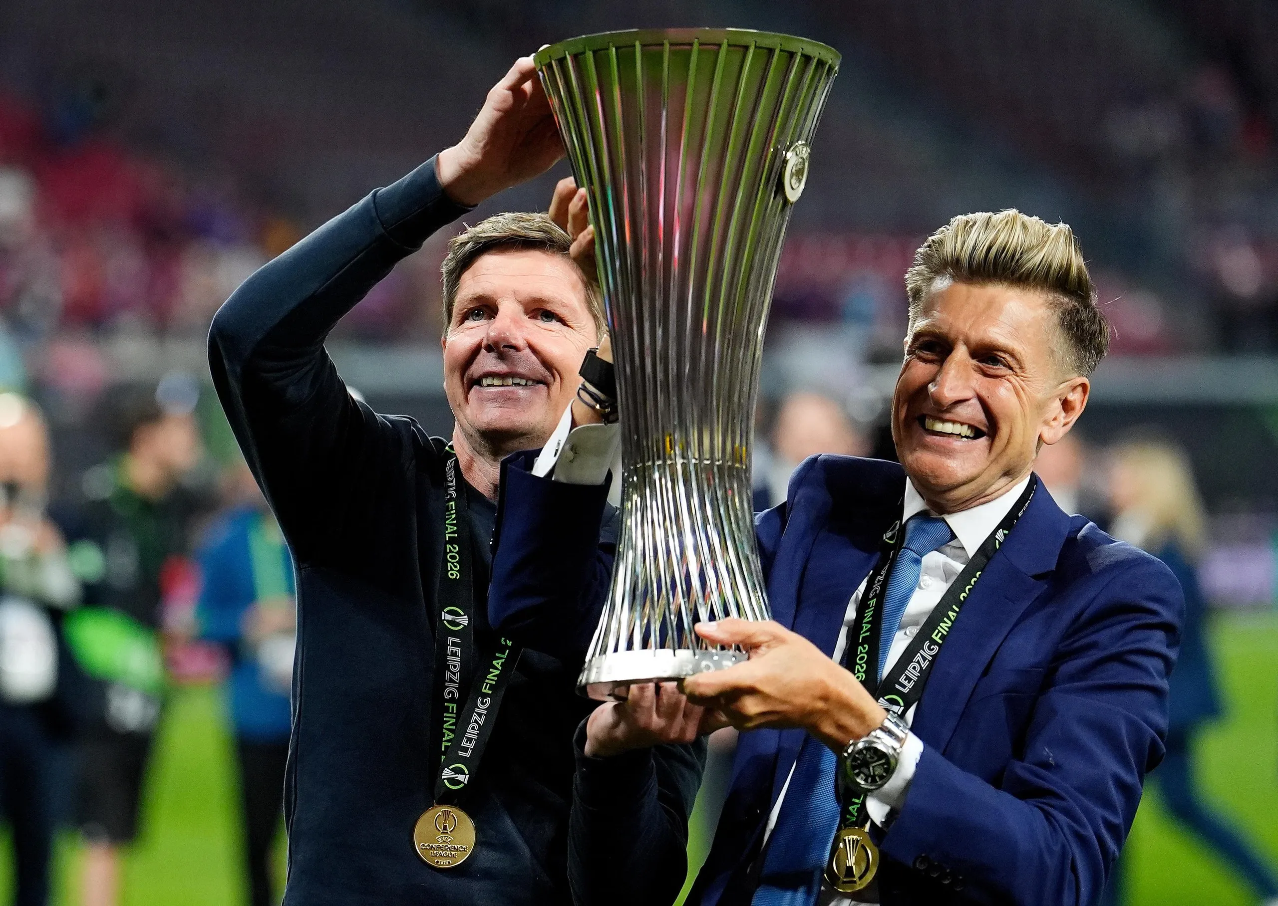 Crystal Palace manager Oliver Glasner and chairman Steve Parish (right) celebrate with the UEFA Europa Conference League trophy.