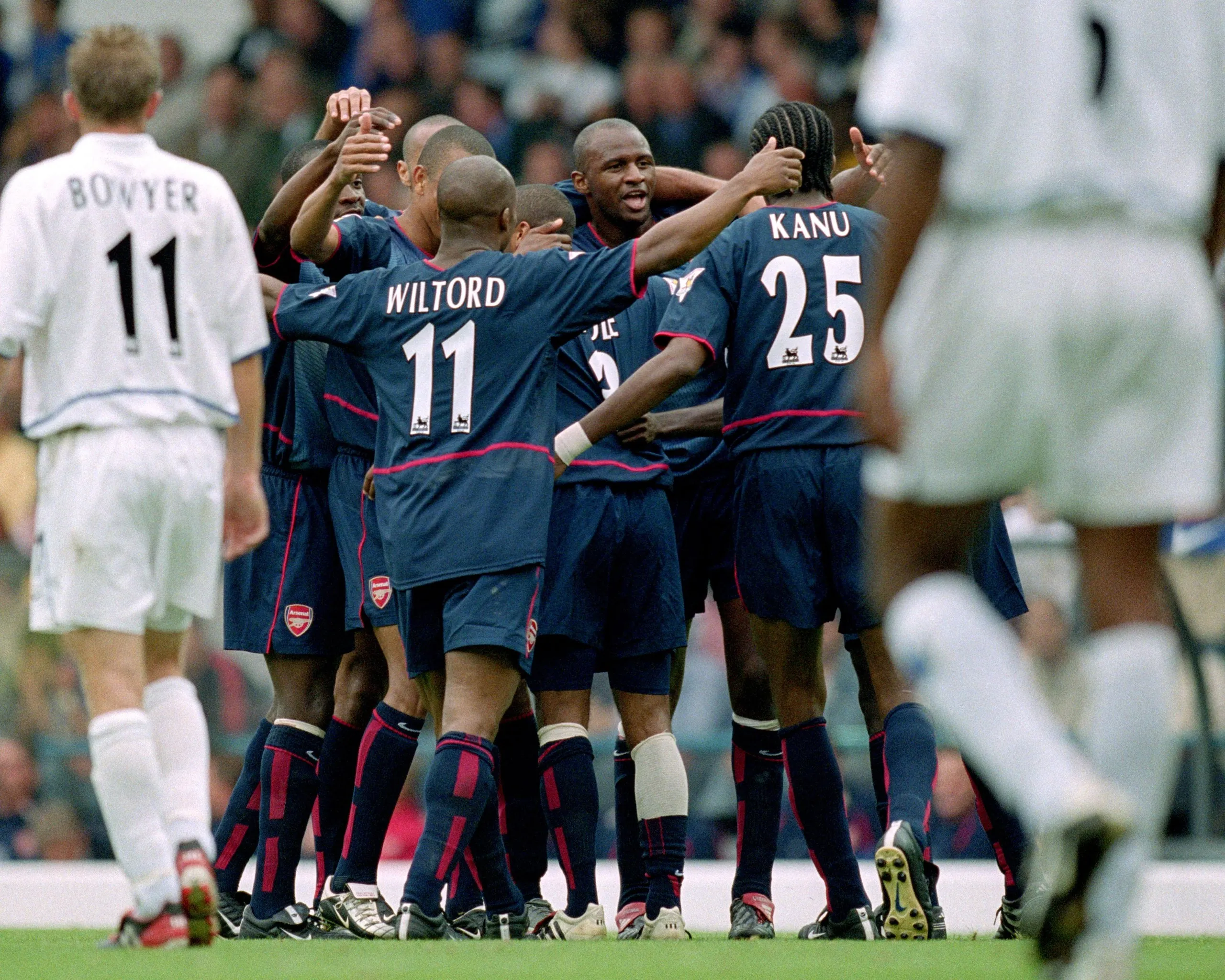 Arsenal players celebrate Kanu’s opening goal in their match against Leeds United in September 2002.