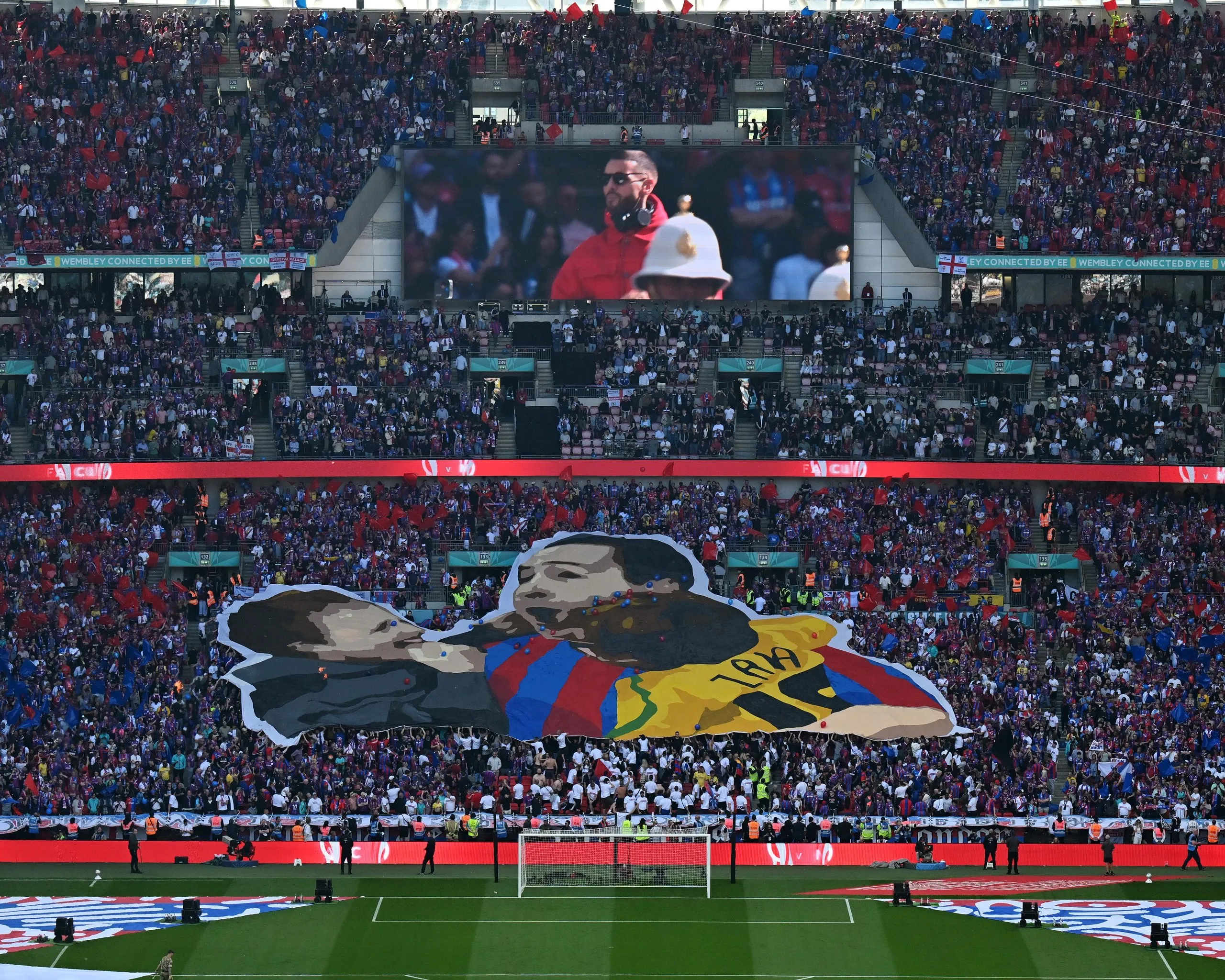 This tifo, at the 2025 FA Cup final, depicts three Palace supporters