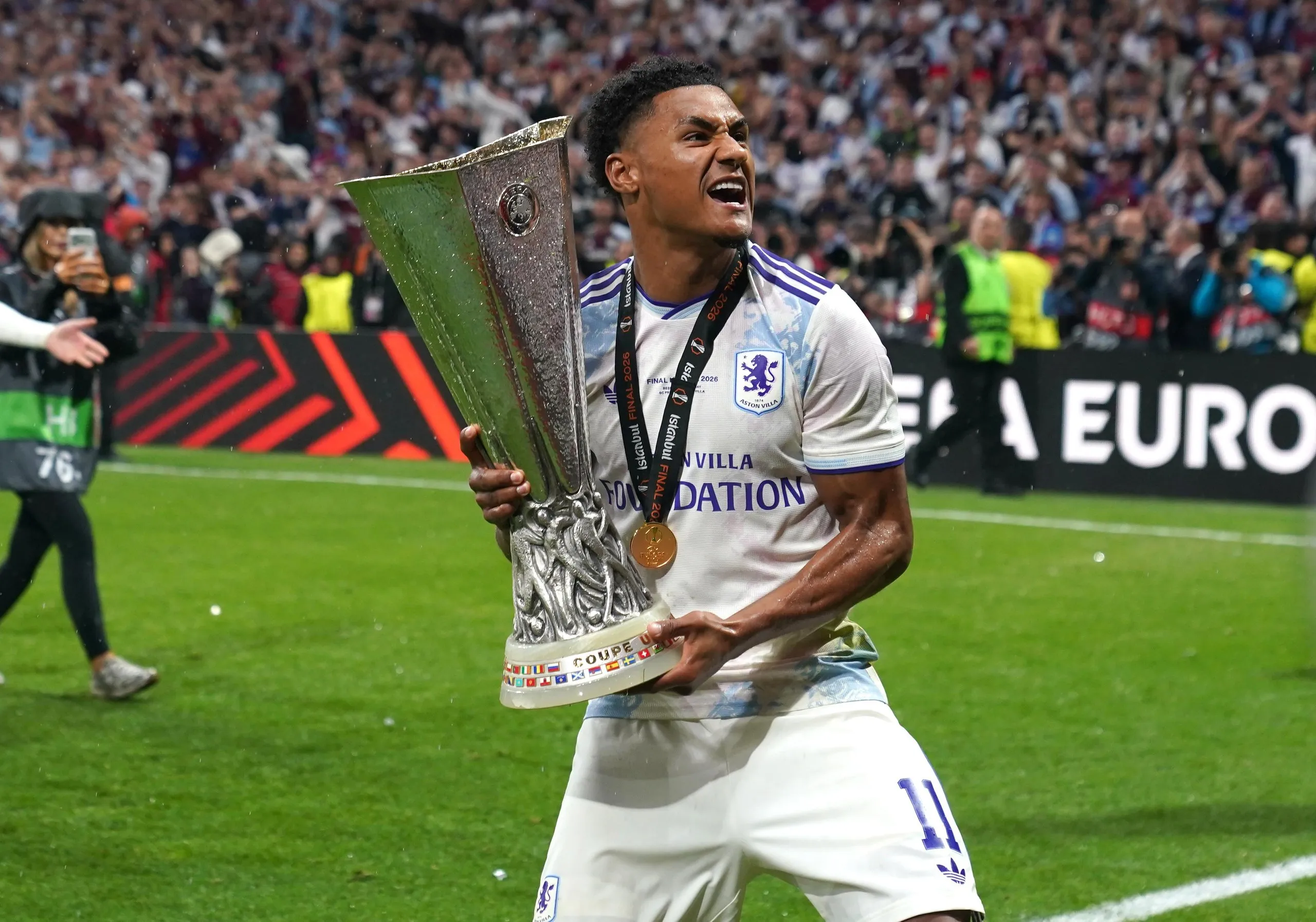 Ollie Watkins celebrates with the trophy after winning the Europa League final