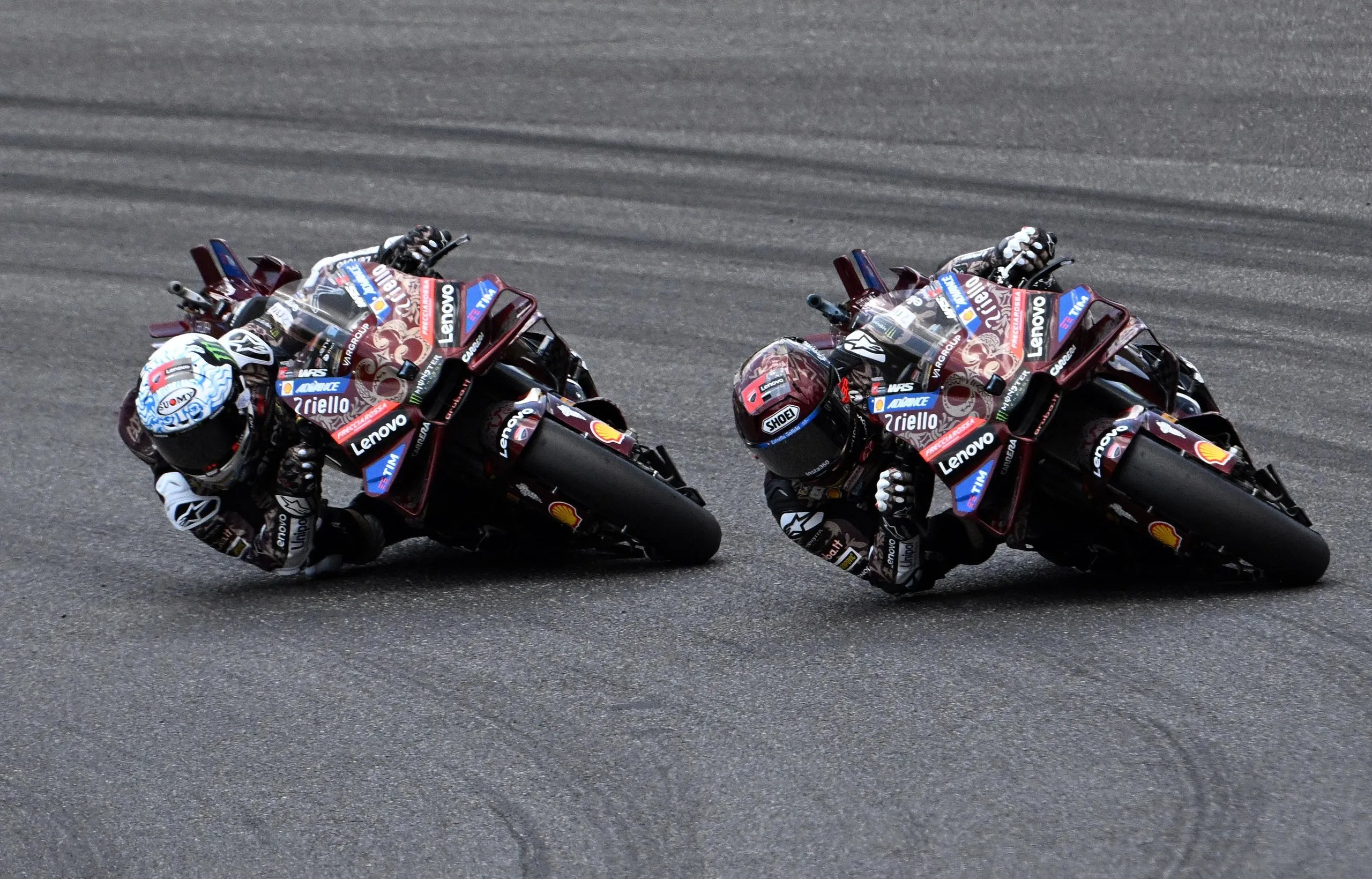 Marc Márquez (right) battles with Francesco Bagnaia