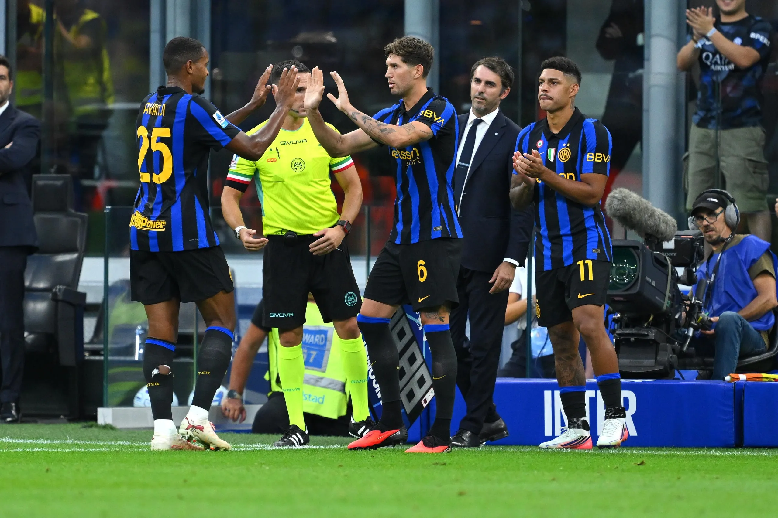 John Stones (right) makes his debut for Inter Milan.