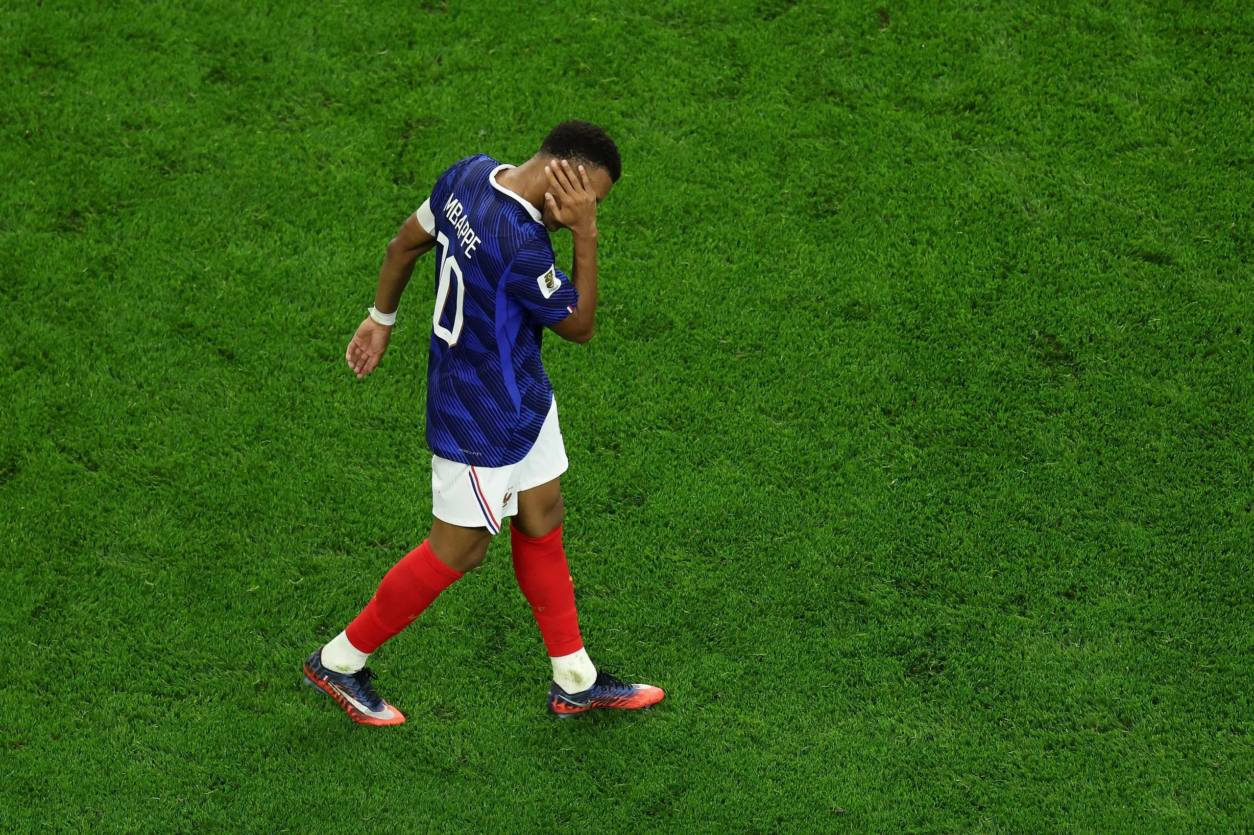 Kylian Mbappe of France reacts after the defeat.