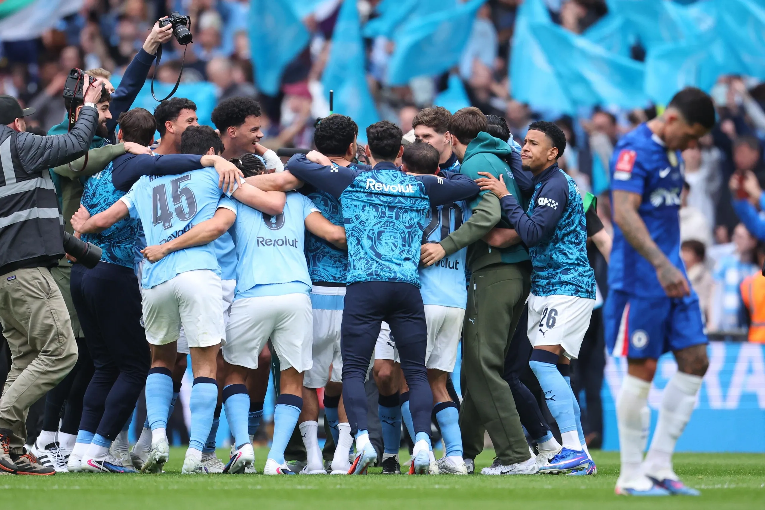 Manchester City players celebrate after winning the FA Cup final against Chelsea.