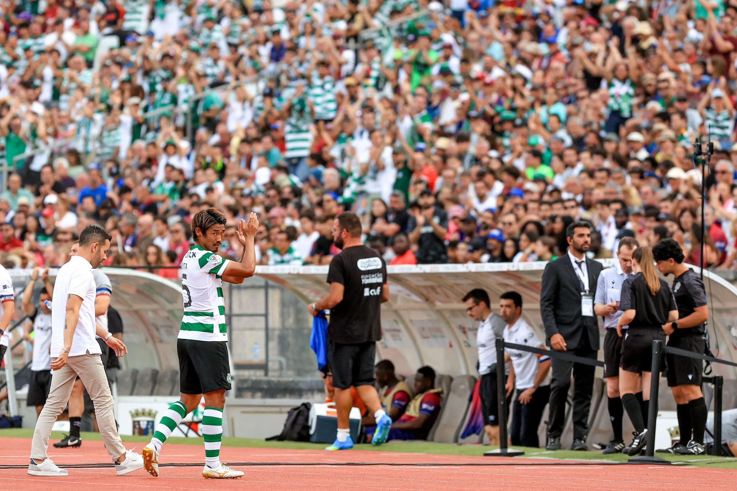 Hidemasa Morita applauds the Sporting fans during the Portuguese Cup final in May