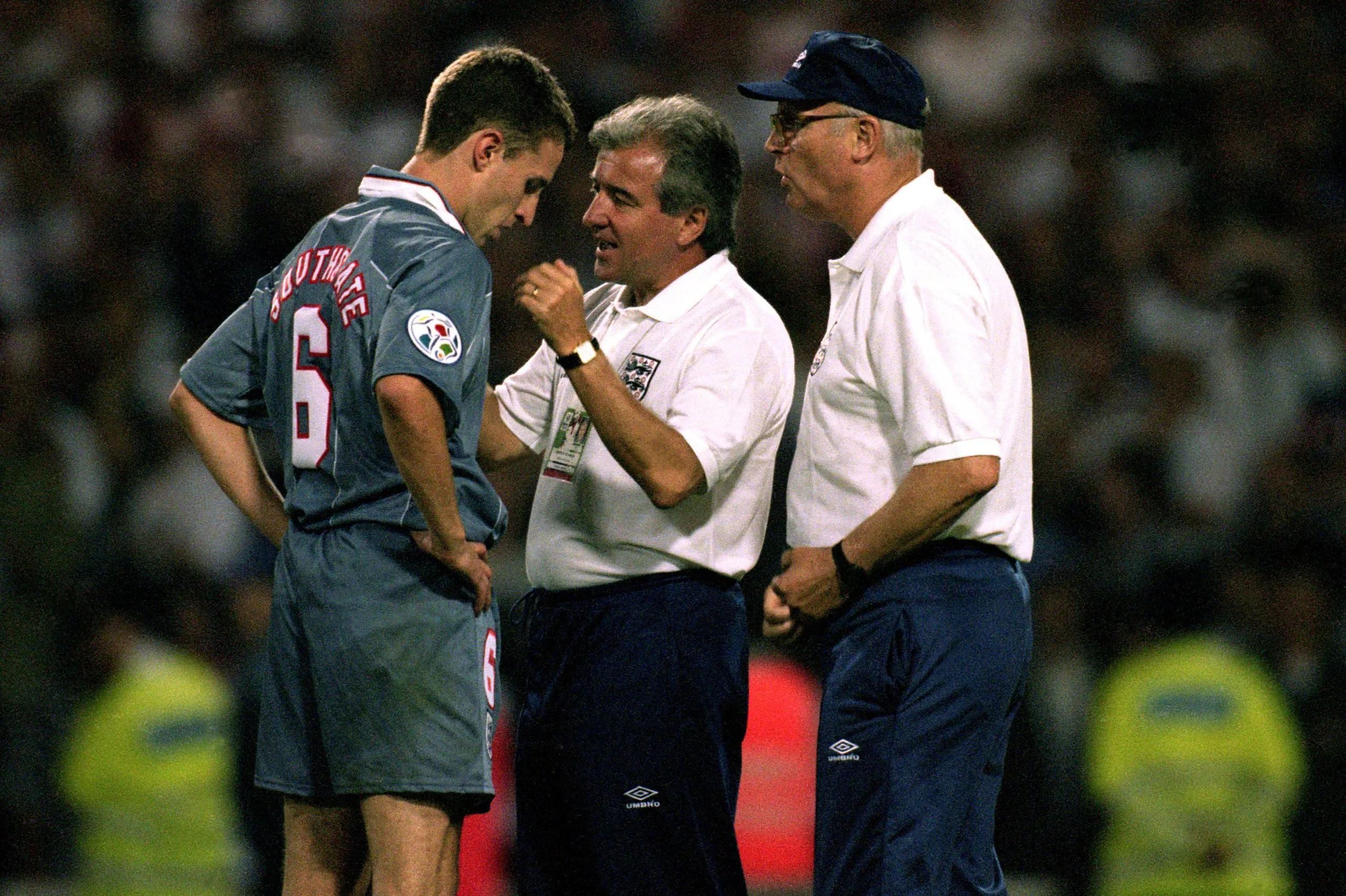 Terry Venables and his assistant Don Howe console Gareth Southgate after his penalty miss