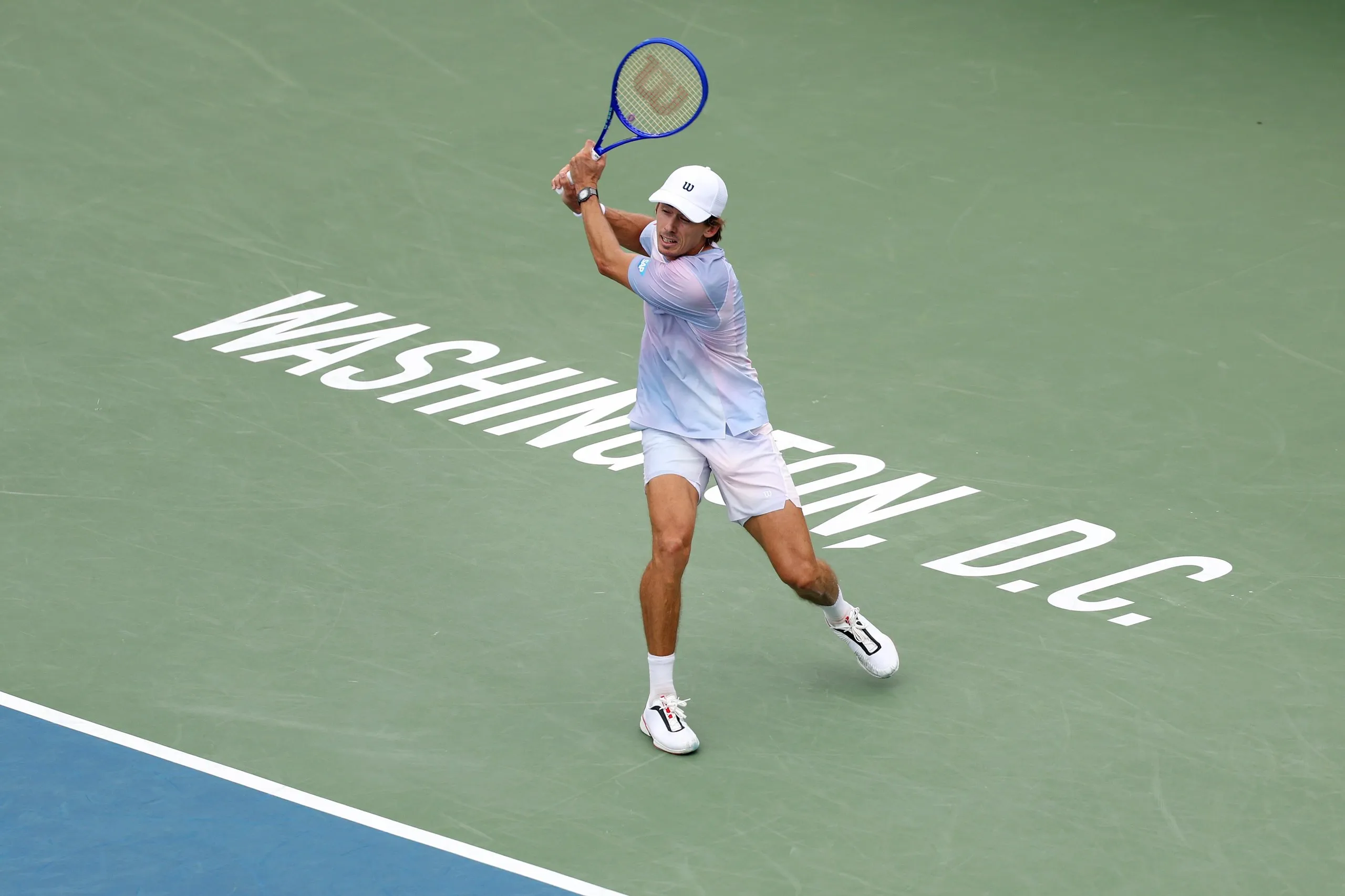 Alex de Minaur playing tennis