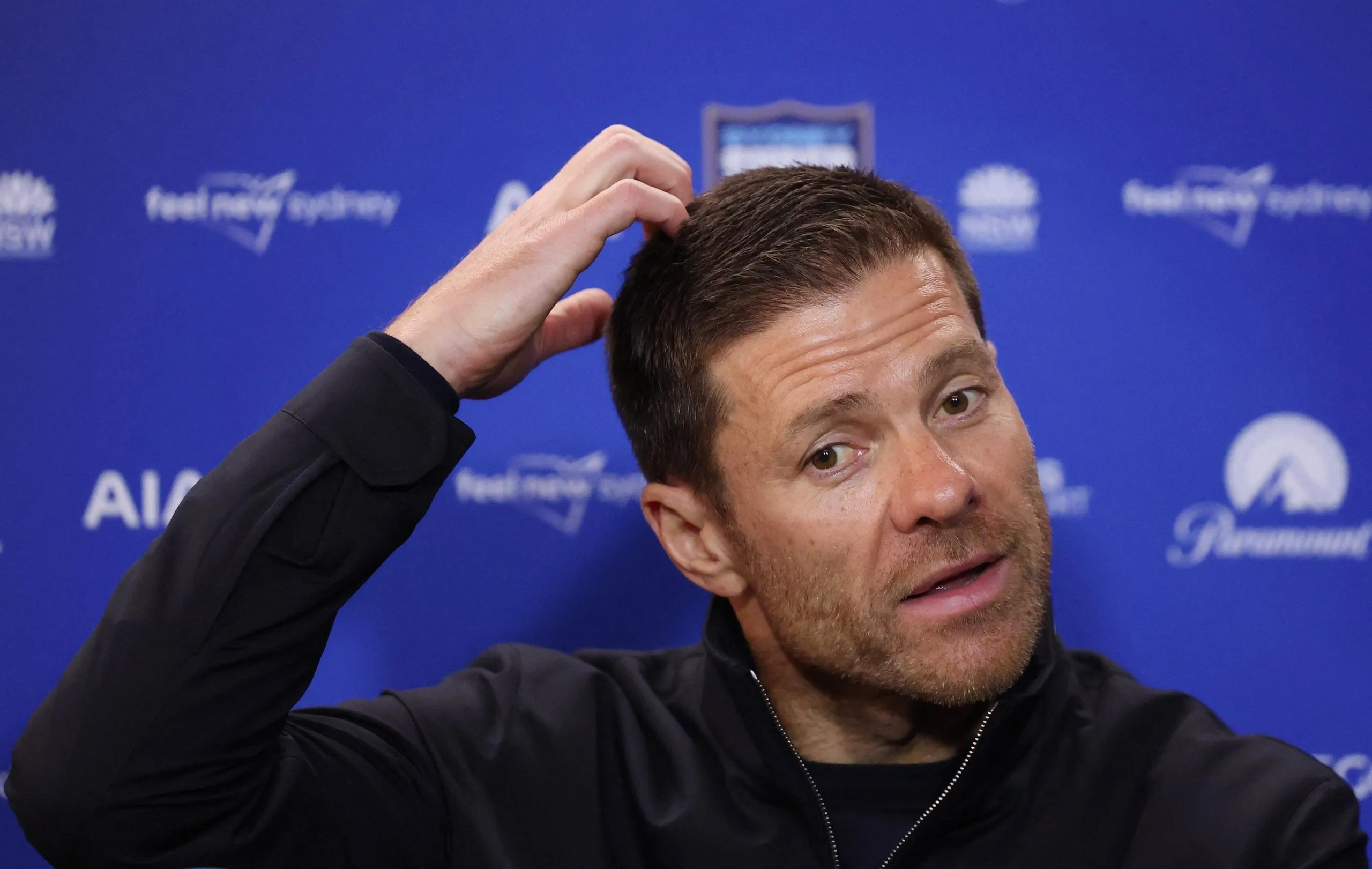 Xabi Alonso scratching his head