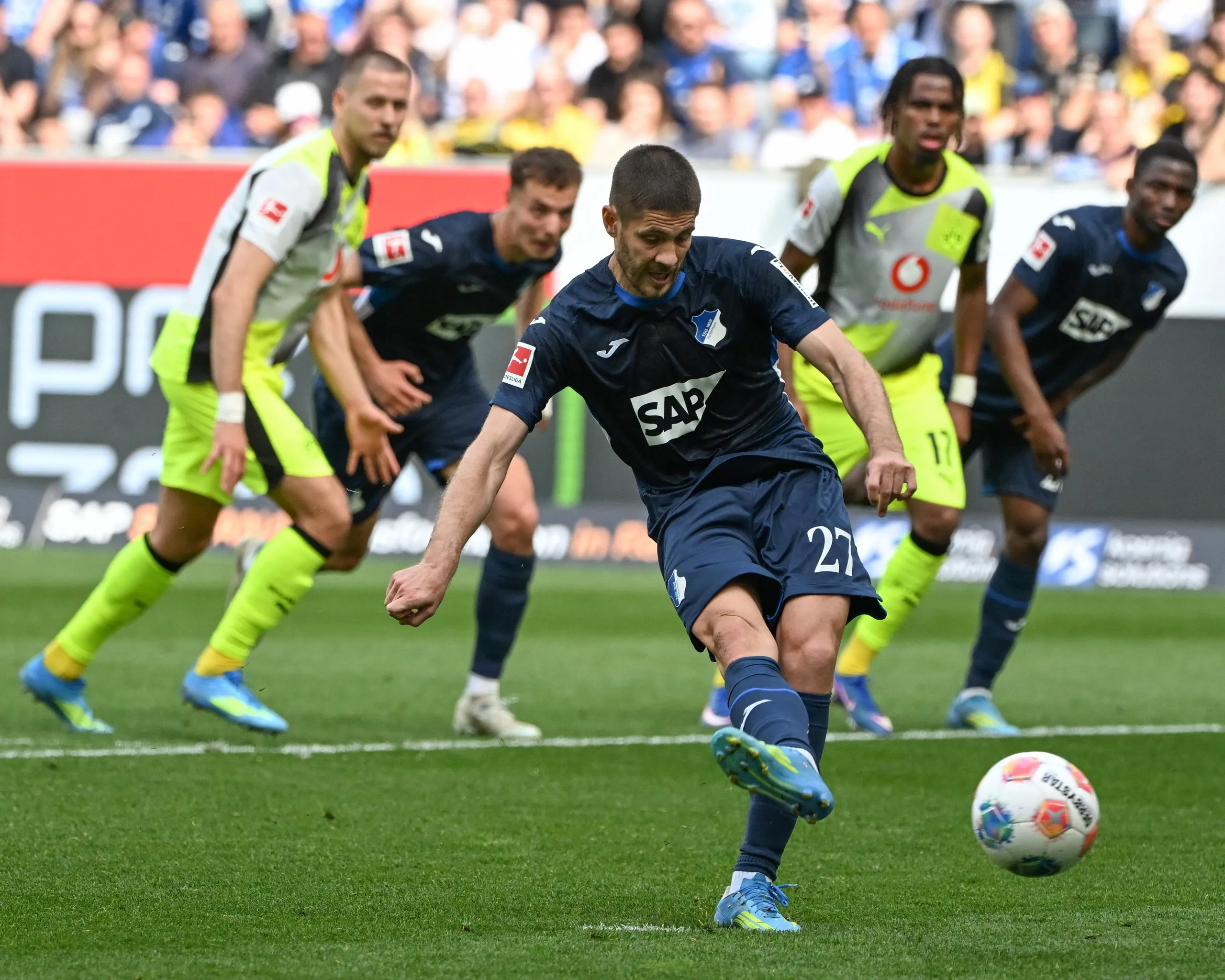 Hoffenheim’s Andrej Kramaric scores a penalty – he struck twice from the spot – against Borussia Dortmund