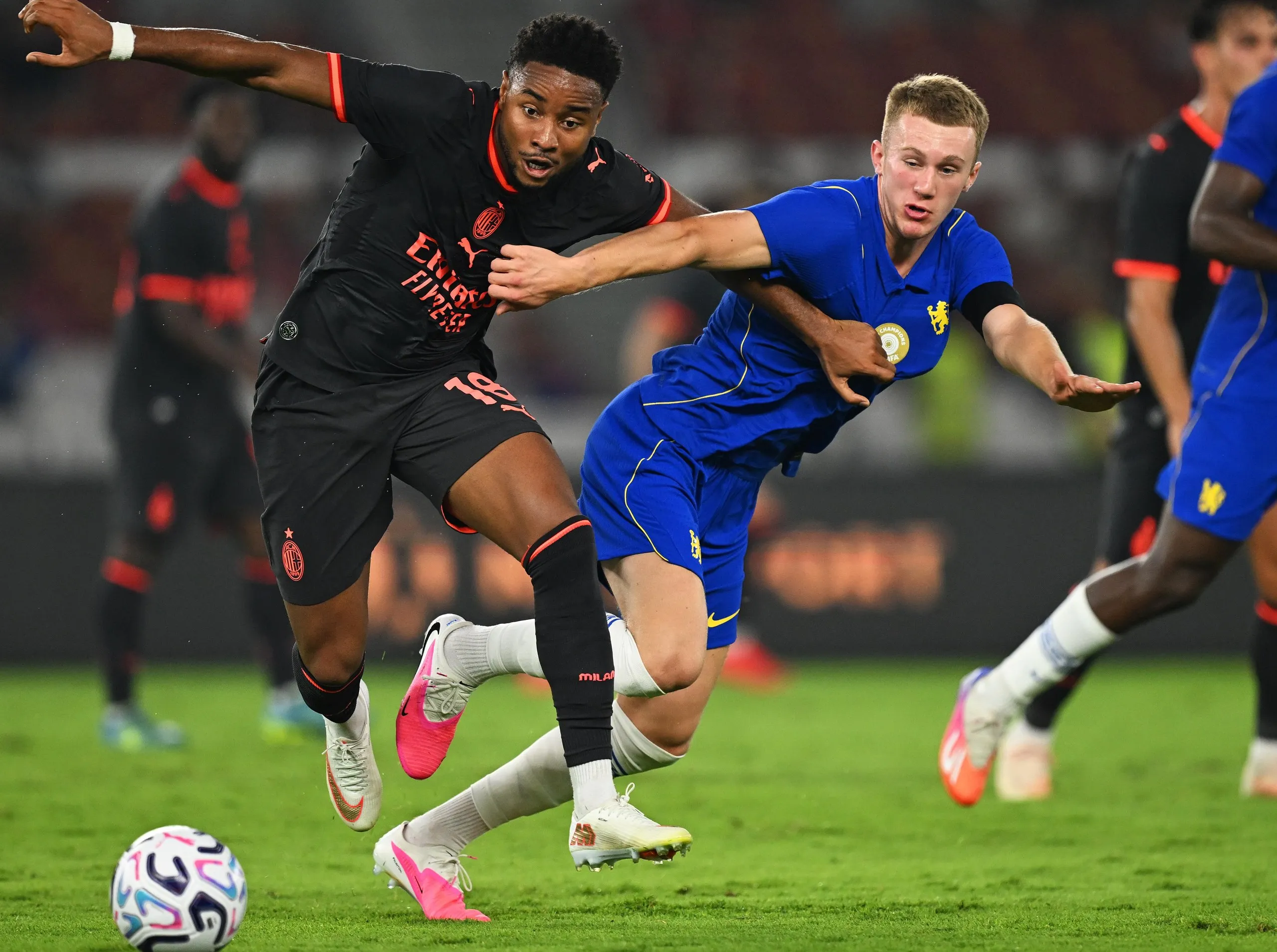 Reggie Watson (right) in pre-season action for Chelsea.
