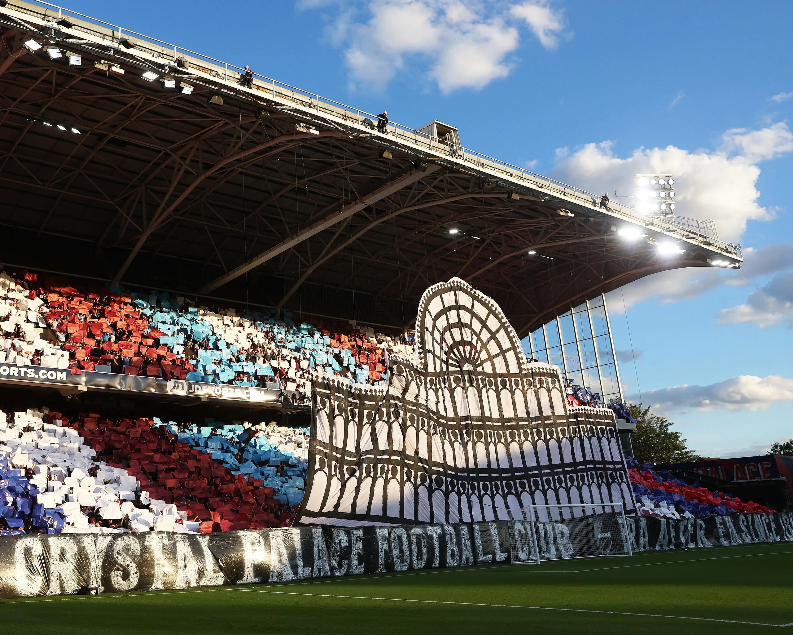 A tifo depicting the Crystal Palace Exhibition building, in August 2022.