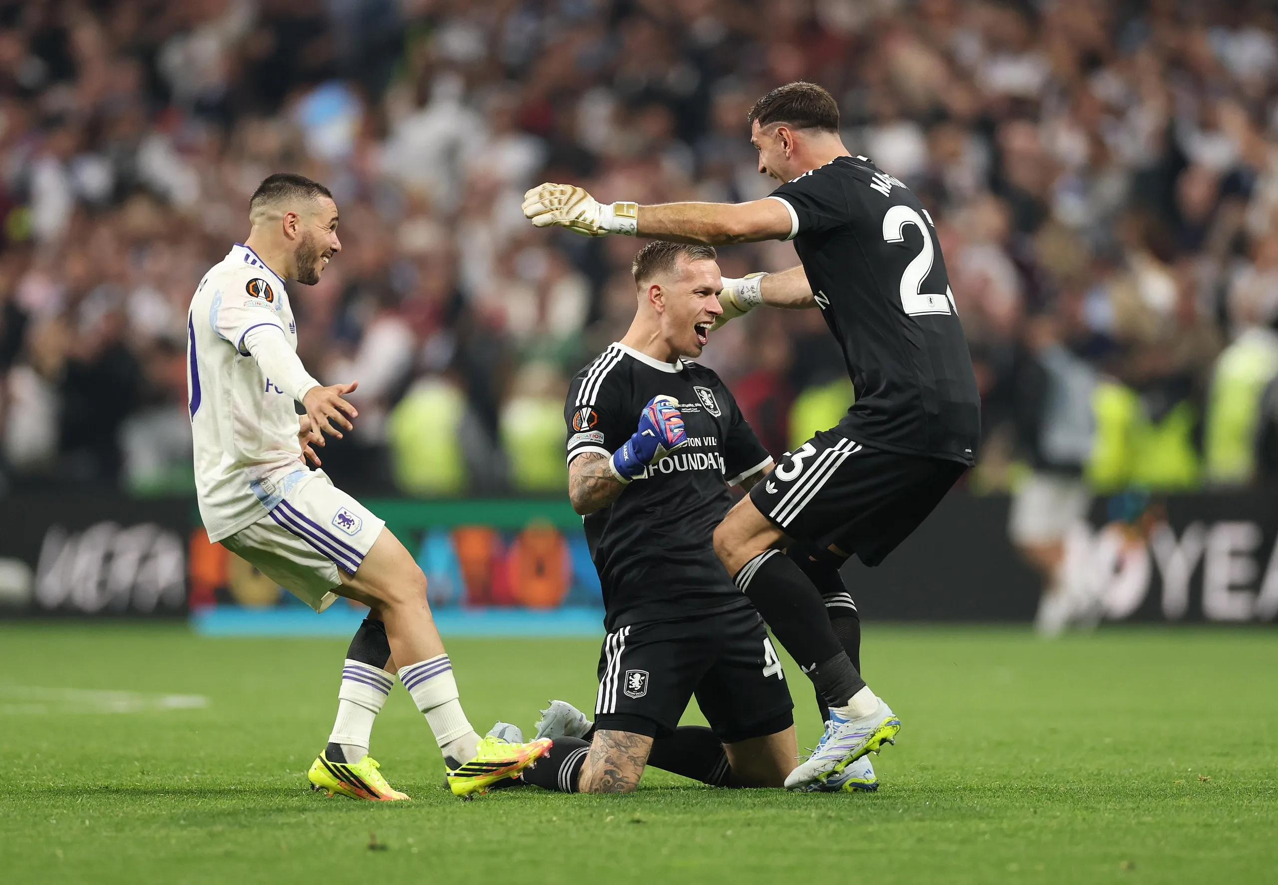 Aston Villa players celebrate after their win in the Europa League final soccer match between Freiburg and Aston Villa in Istanbul