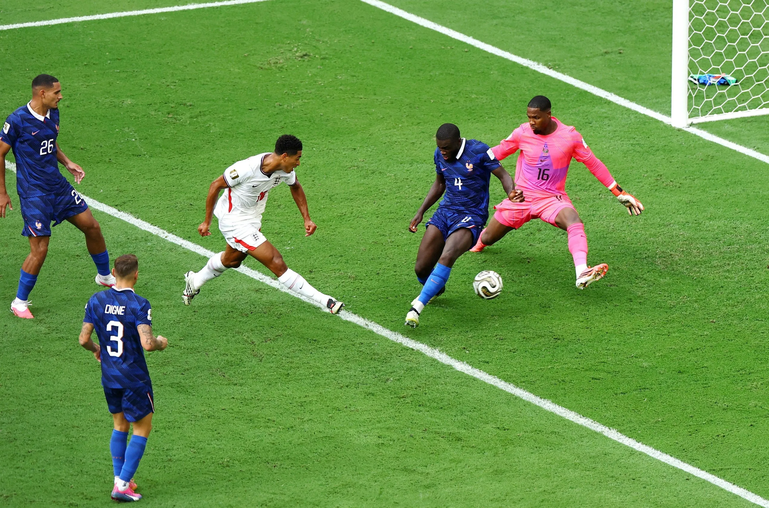 Jude Bellingham scores past Mike Maignan and Dayot Upamecano