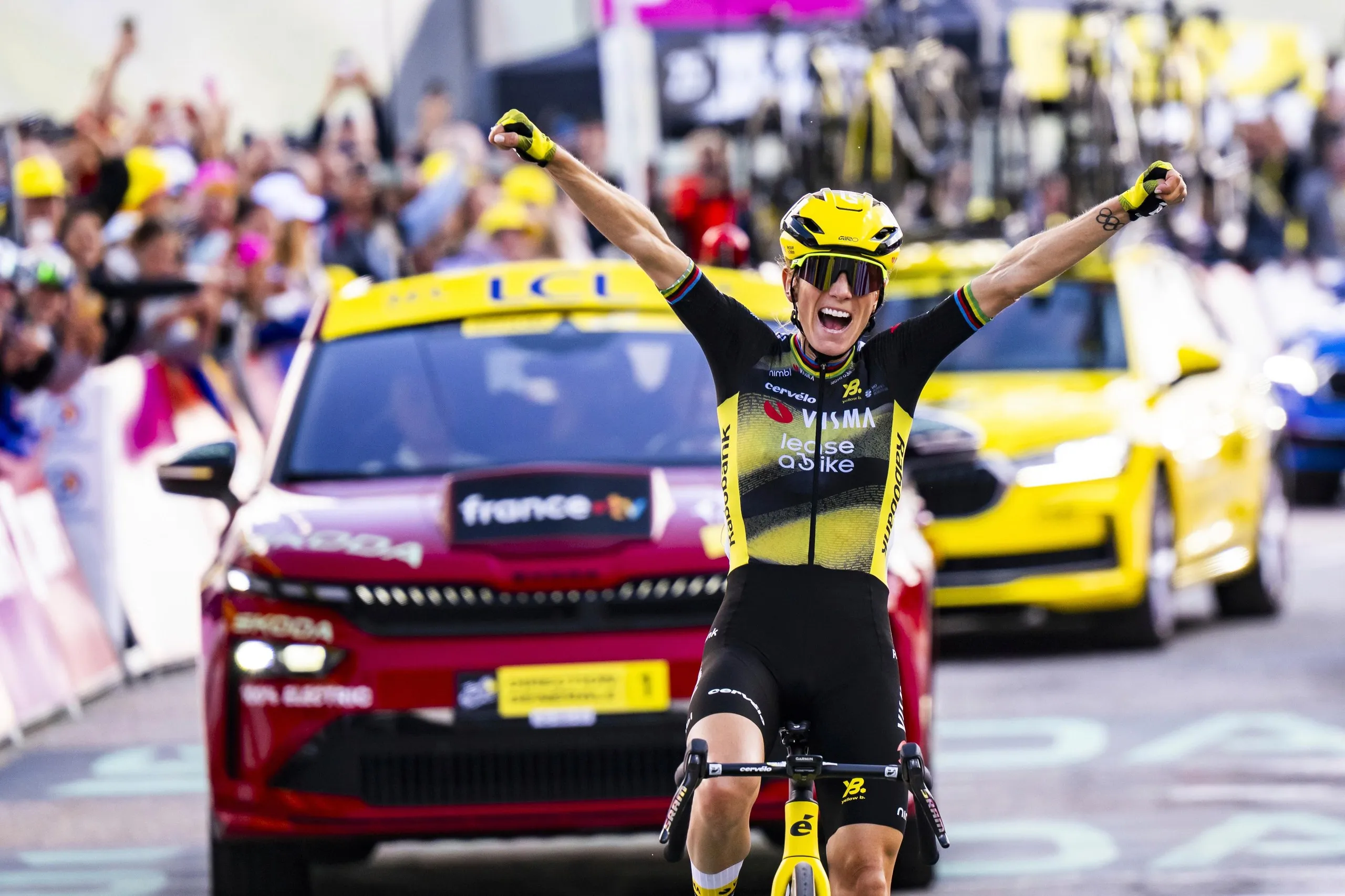 Pauline Ferrand-Prévot celebrates as she wins the eighth stage of the Tour de France Femmes in 2025