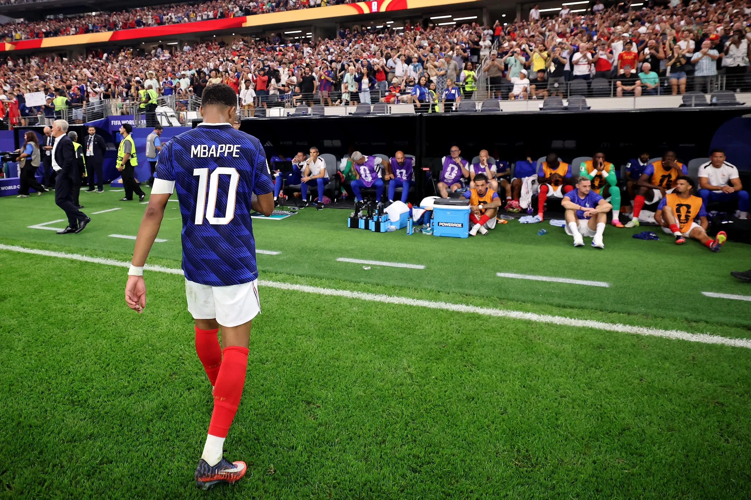 Kylian Mbappé trudges off after the semi-final defeat