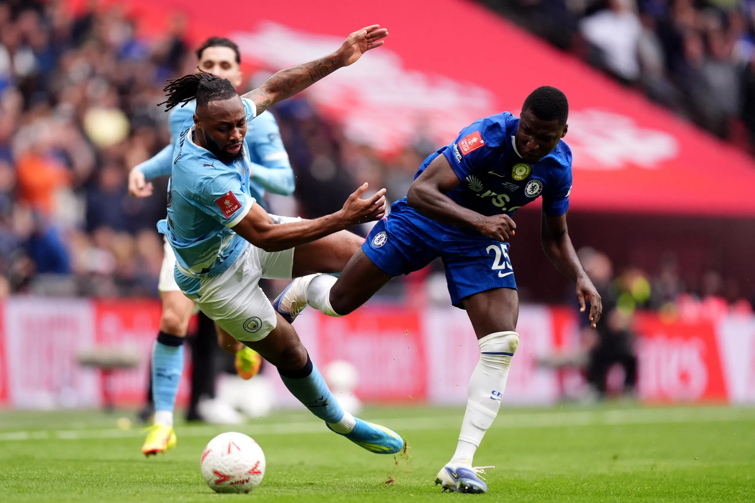 Chelsea's Moises Caicedo upends Manchester City's Antoine Semenyo (left).