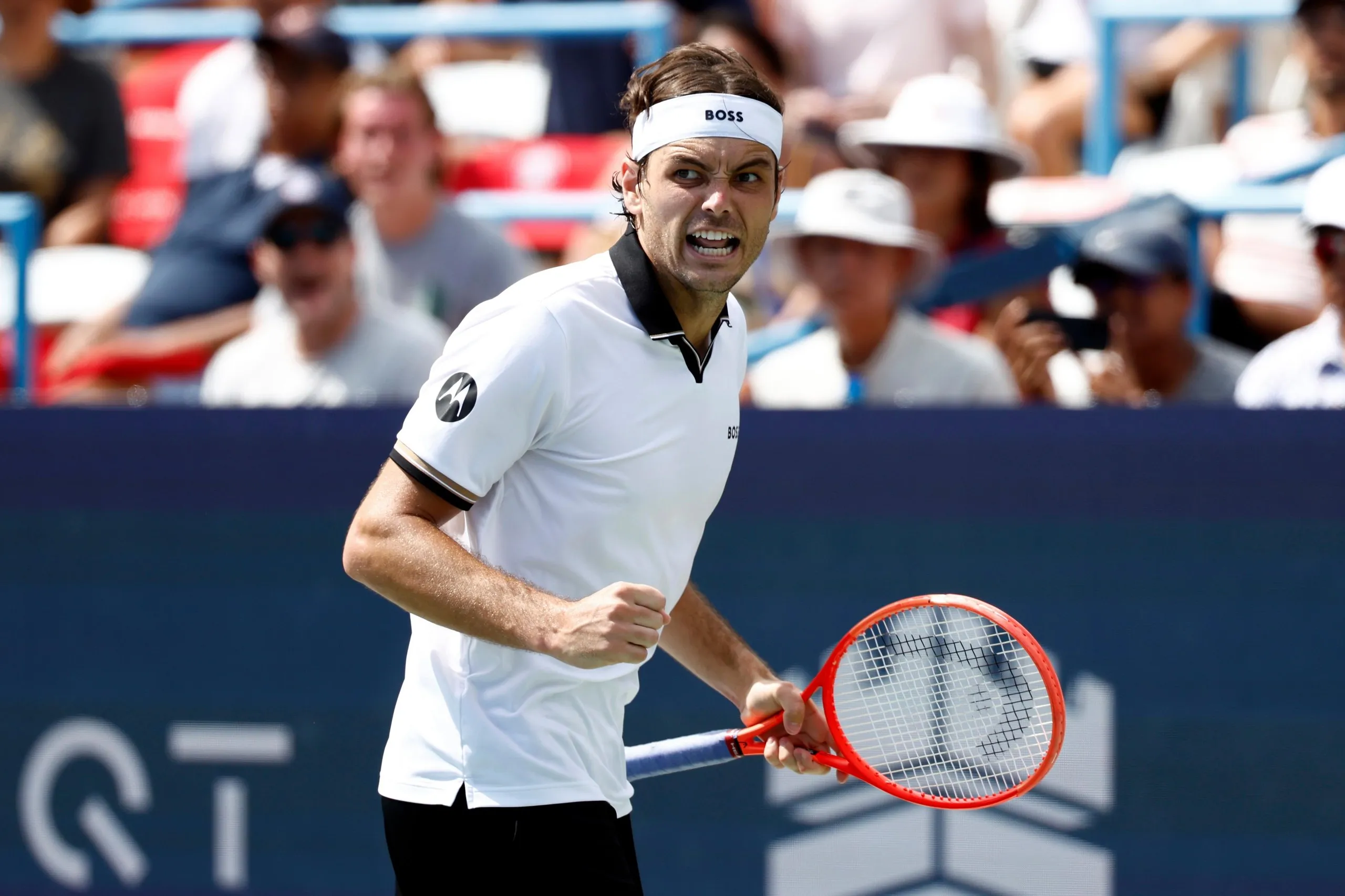 Taylor Fritz celebrates a point with a fist-pump at the DC Open final.