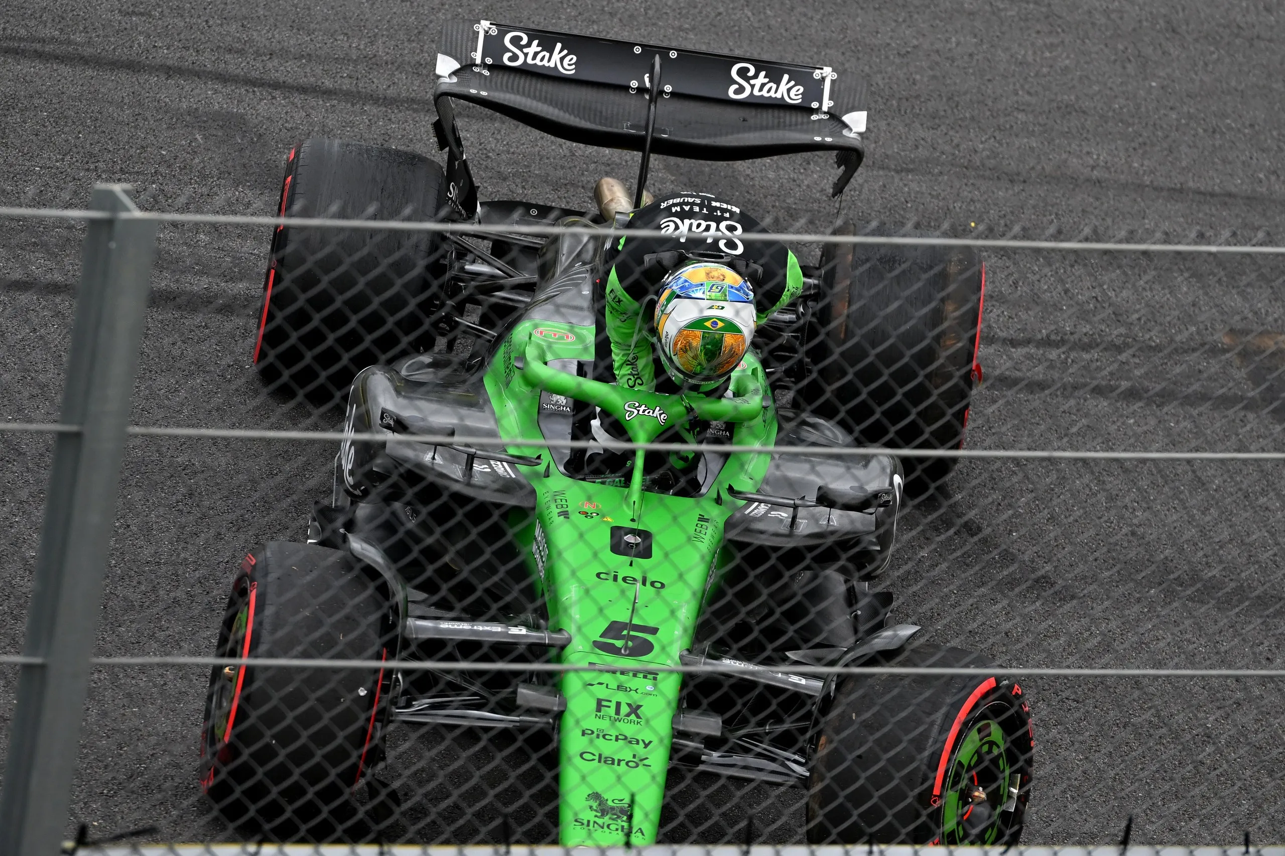 Sauber Formula One car next to fence