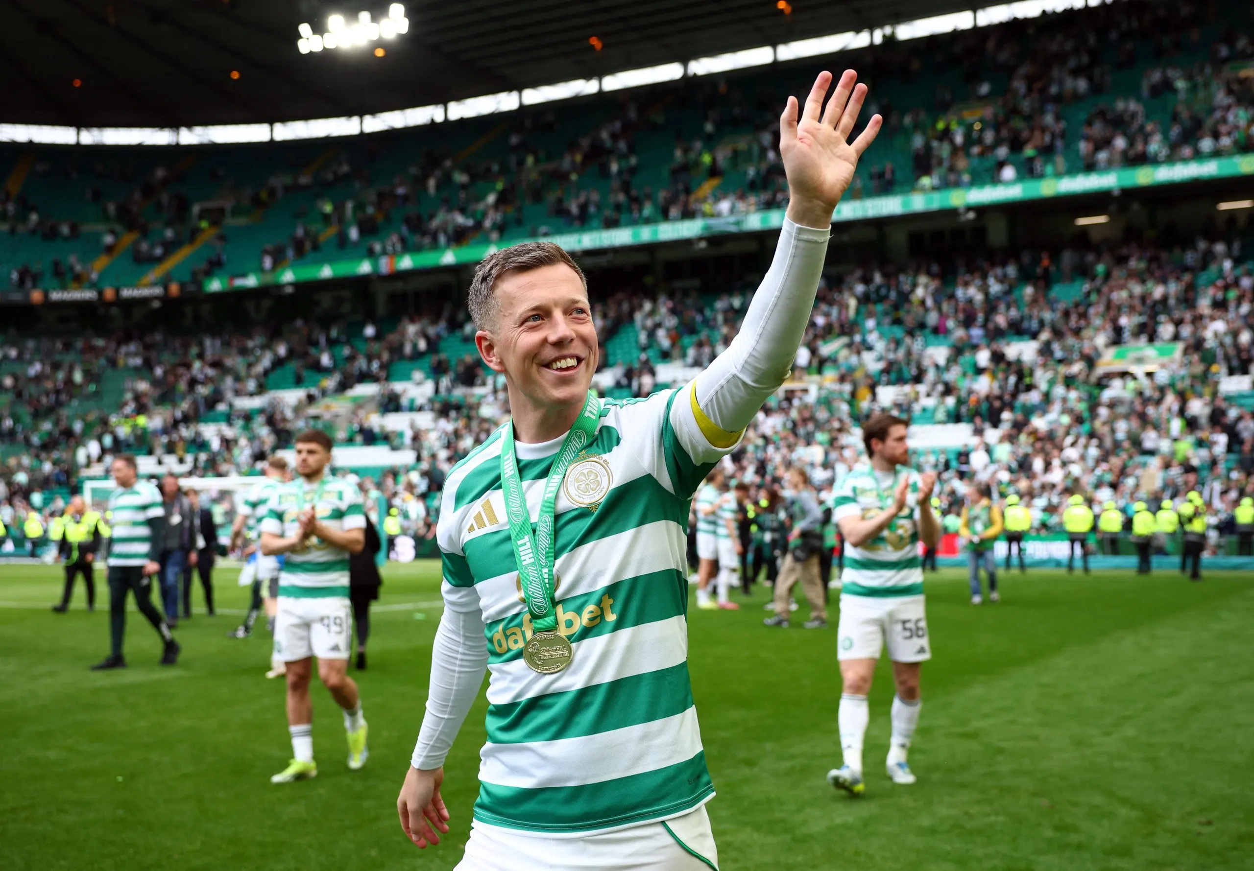 Celtic's Callum McGregor celebrates winning the Scottish Premiership.
