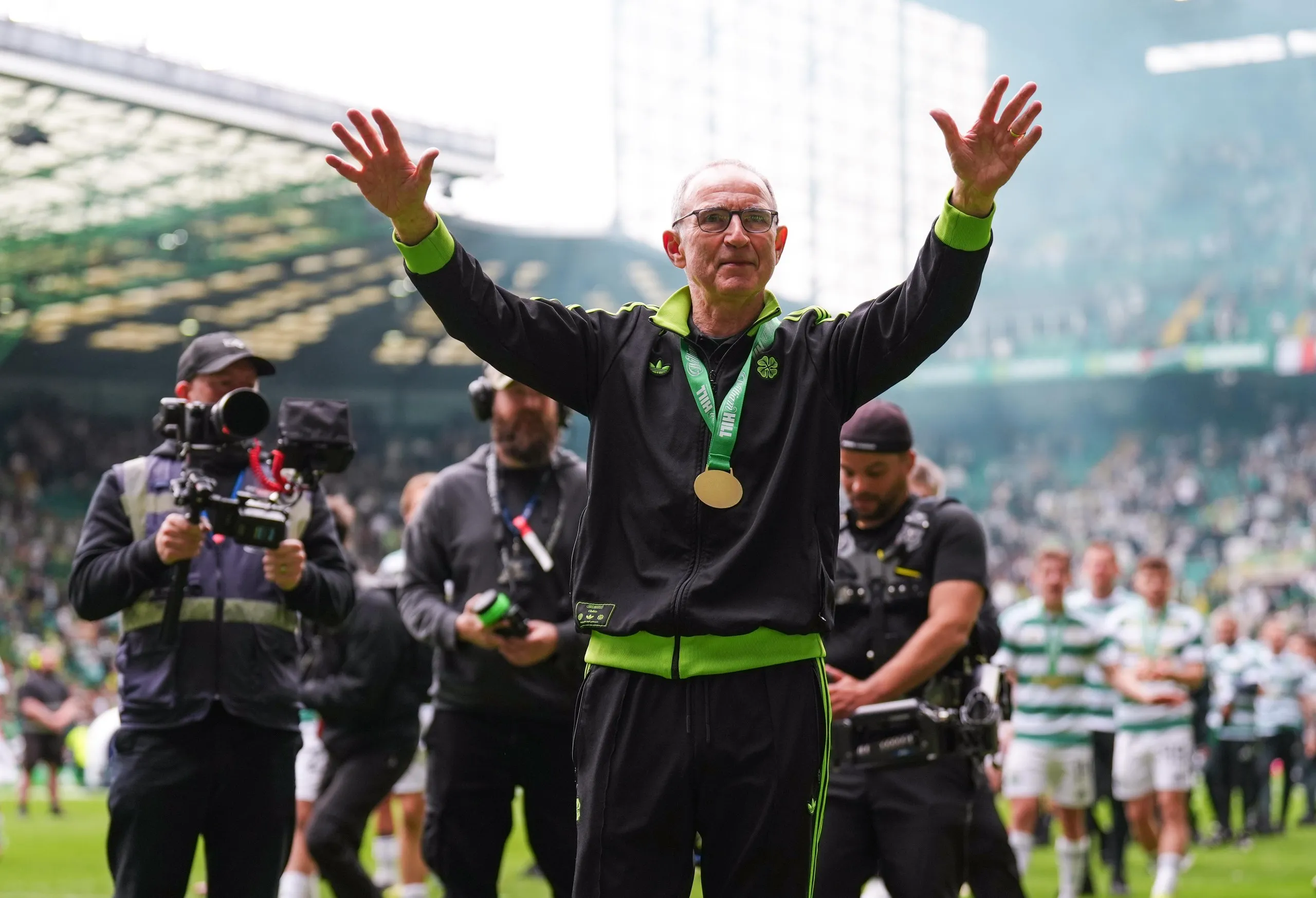 Celtic manager Martin O'Neill celebrates victory following his side's title deciding match against Hearts.