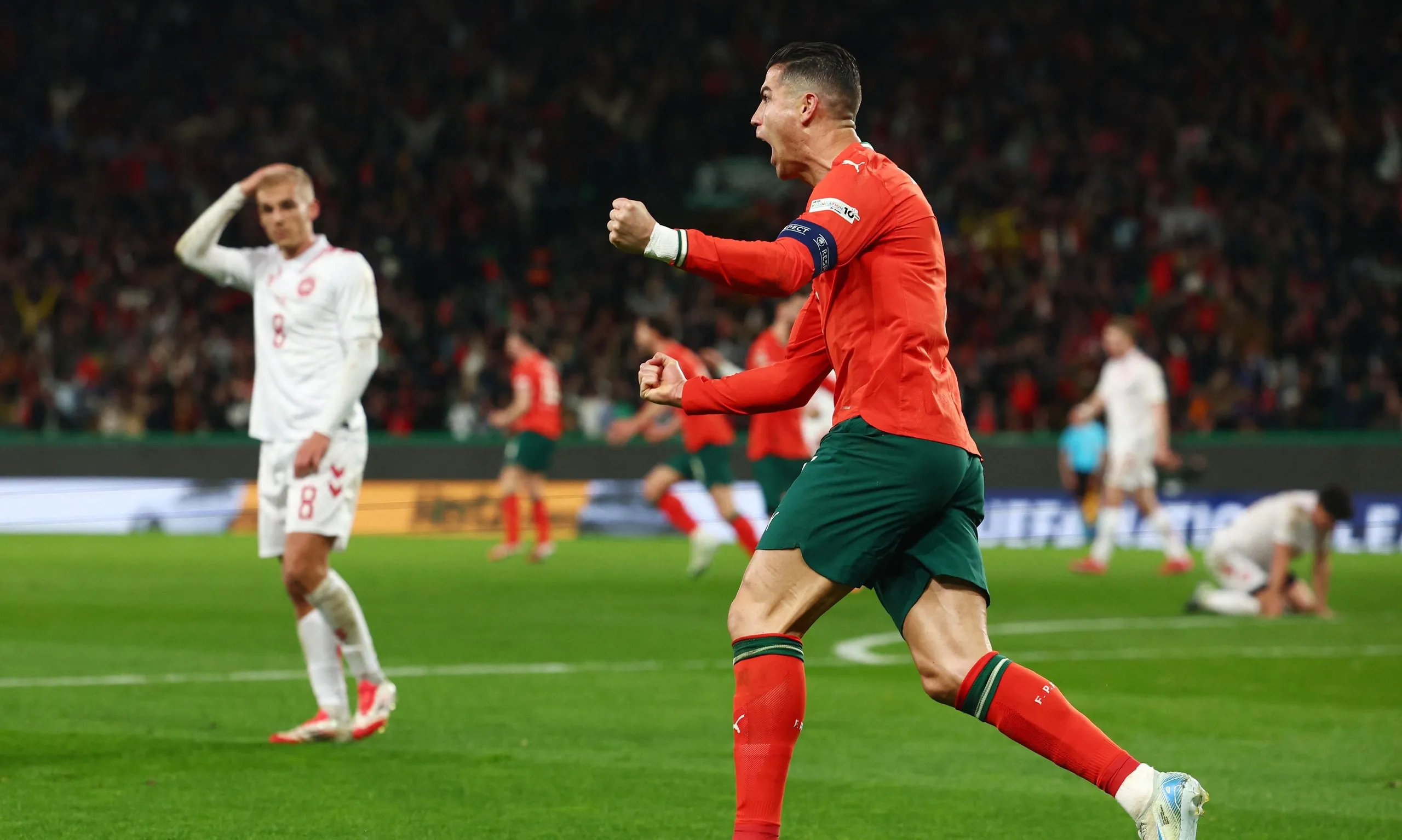 Cristiano Ronaldo celebrates scoring Portugal’s second goal