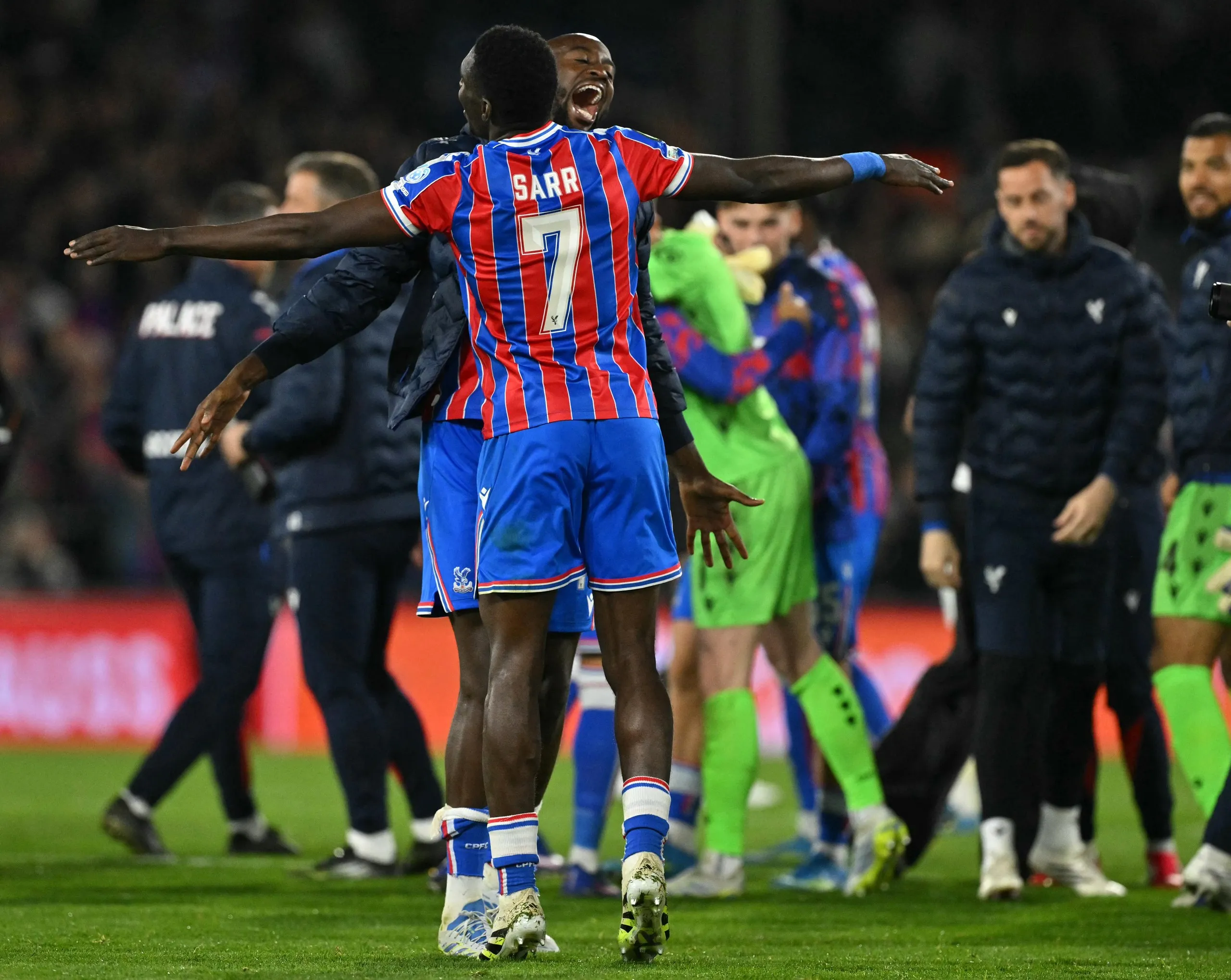 Jean-Philippe Mateta and Crystal Palace's Senegalese midfielder #07 Ismaila Sarr celebrate at the full-time whistle