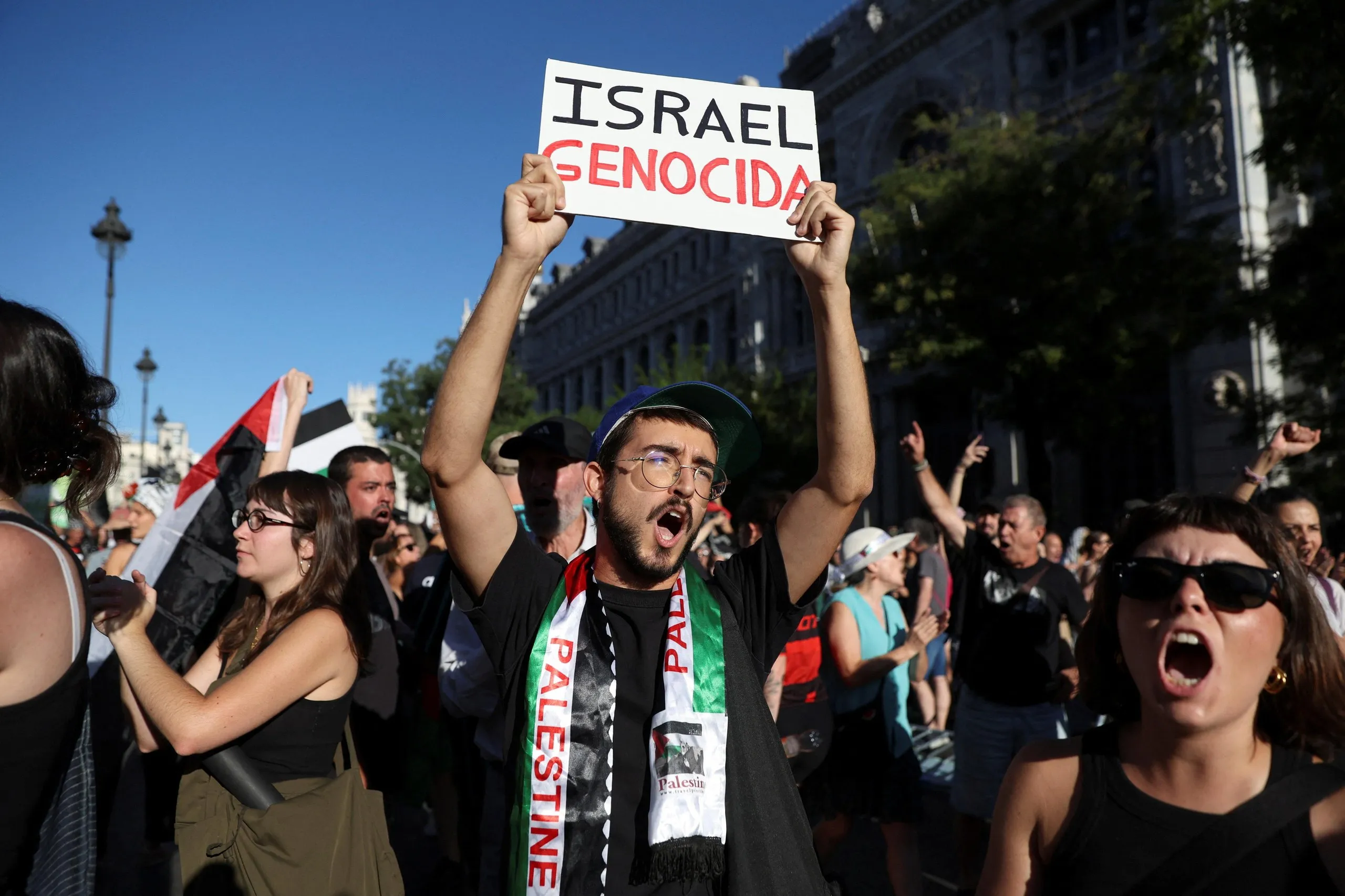 A protester in Madrid accuses Israel of genocide
