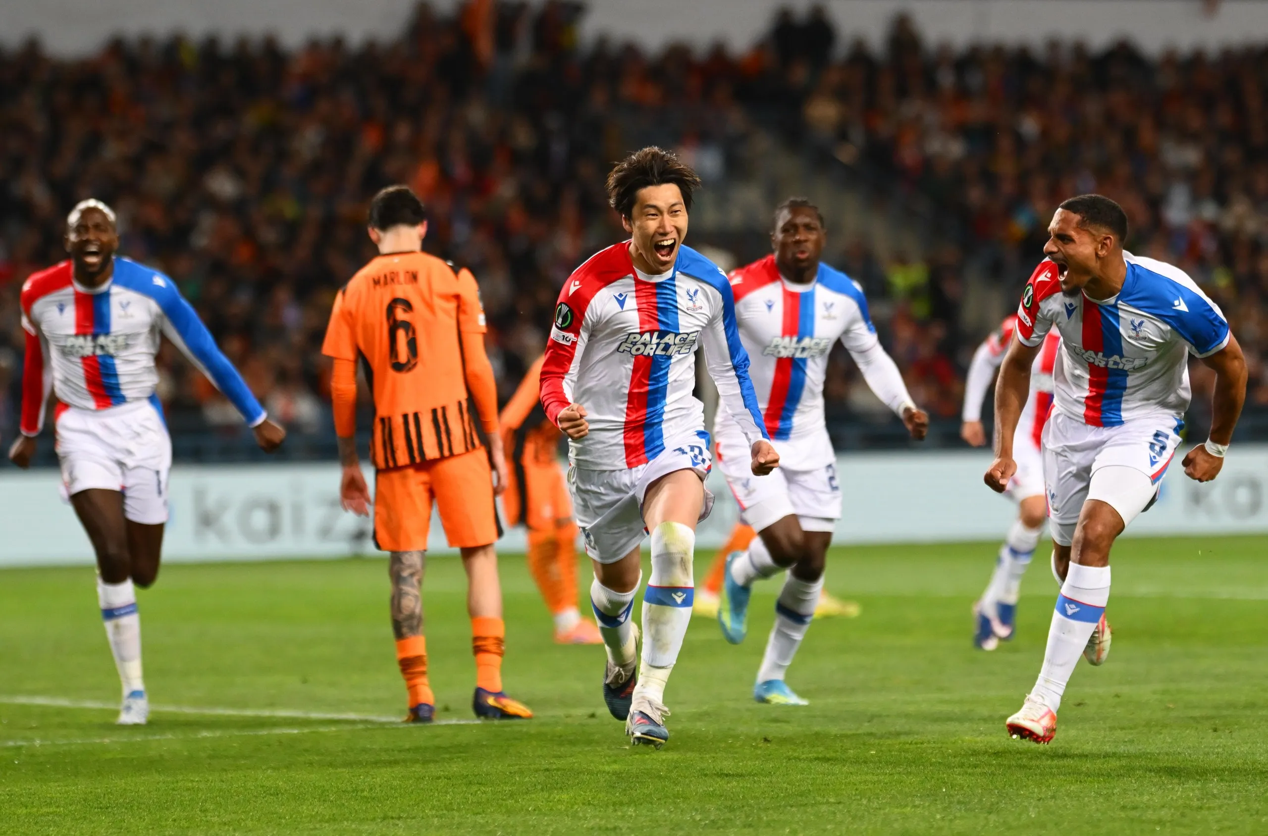 Daichi Kamada celebrates after restoring Crystal Palace’s lead.