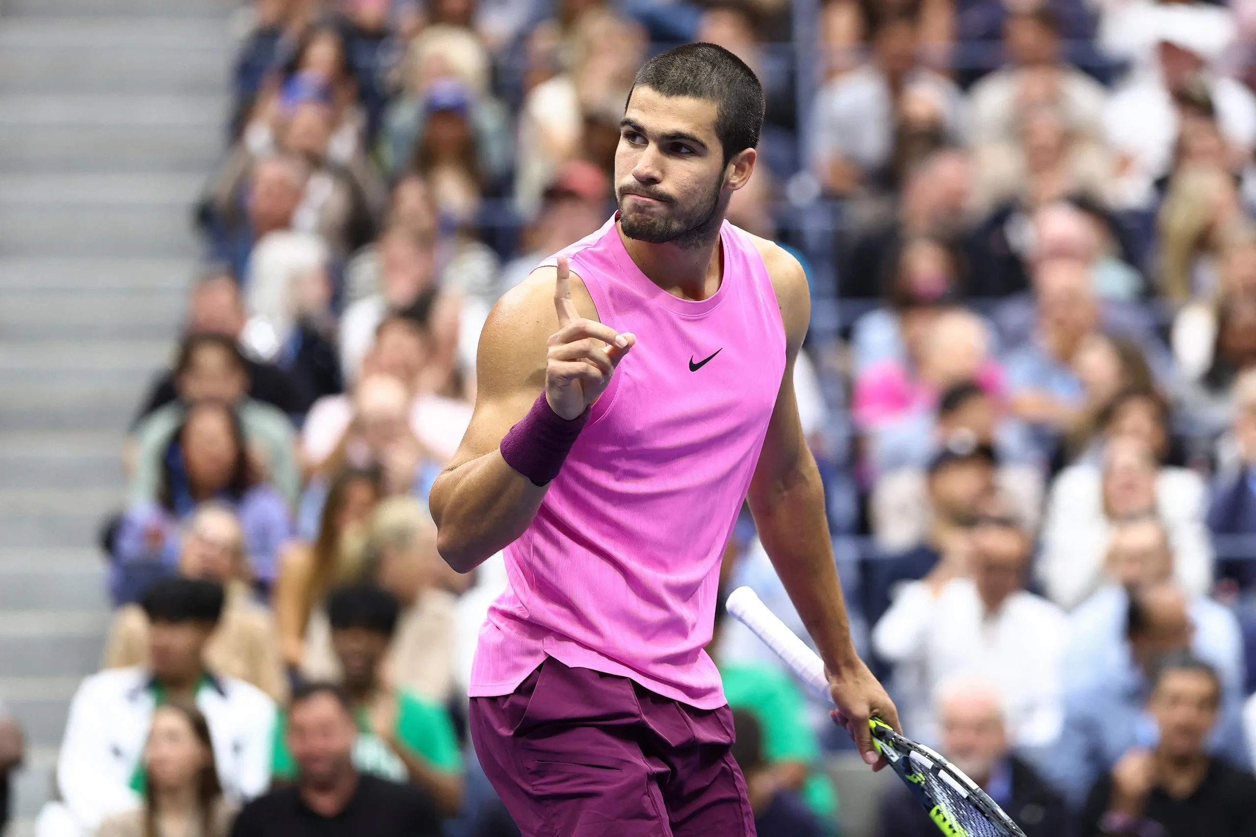 Spain's Carlos Alcaraz reacts after a point against Italy's Jannik Sinner.
