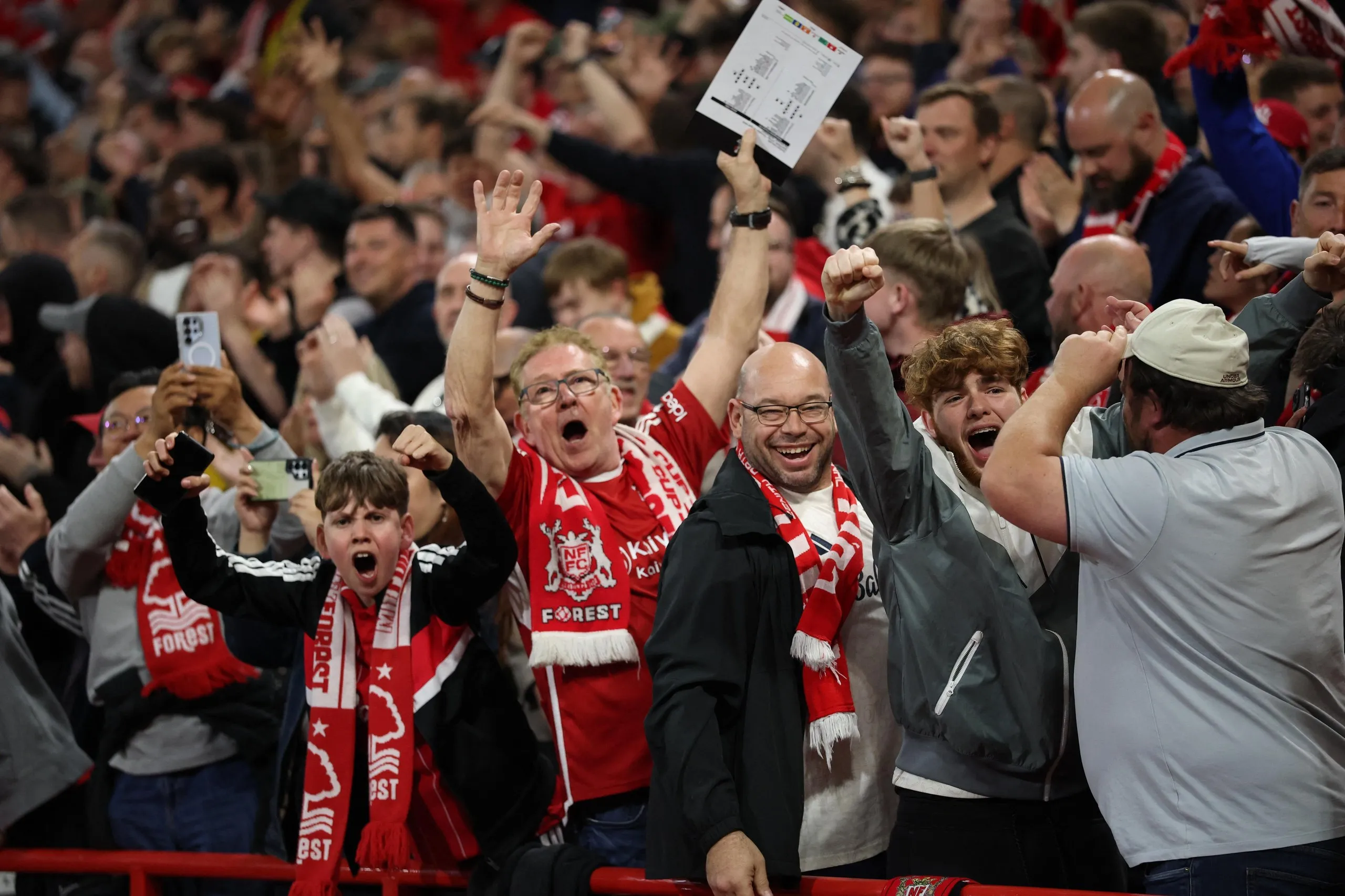 Nottingham Forest fans celebrate after Chris Wood scores their first goal.