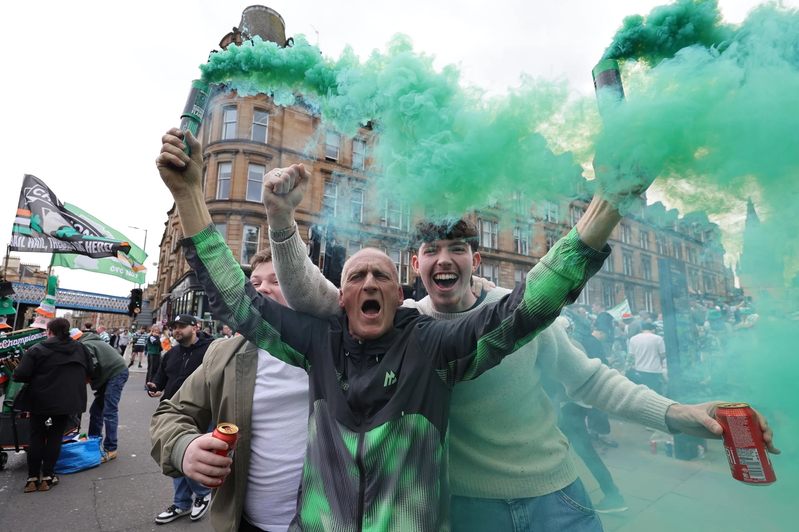 Celtic fans celebrate in Glasgow after their side won the Premiership title.