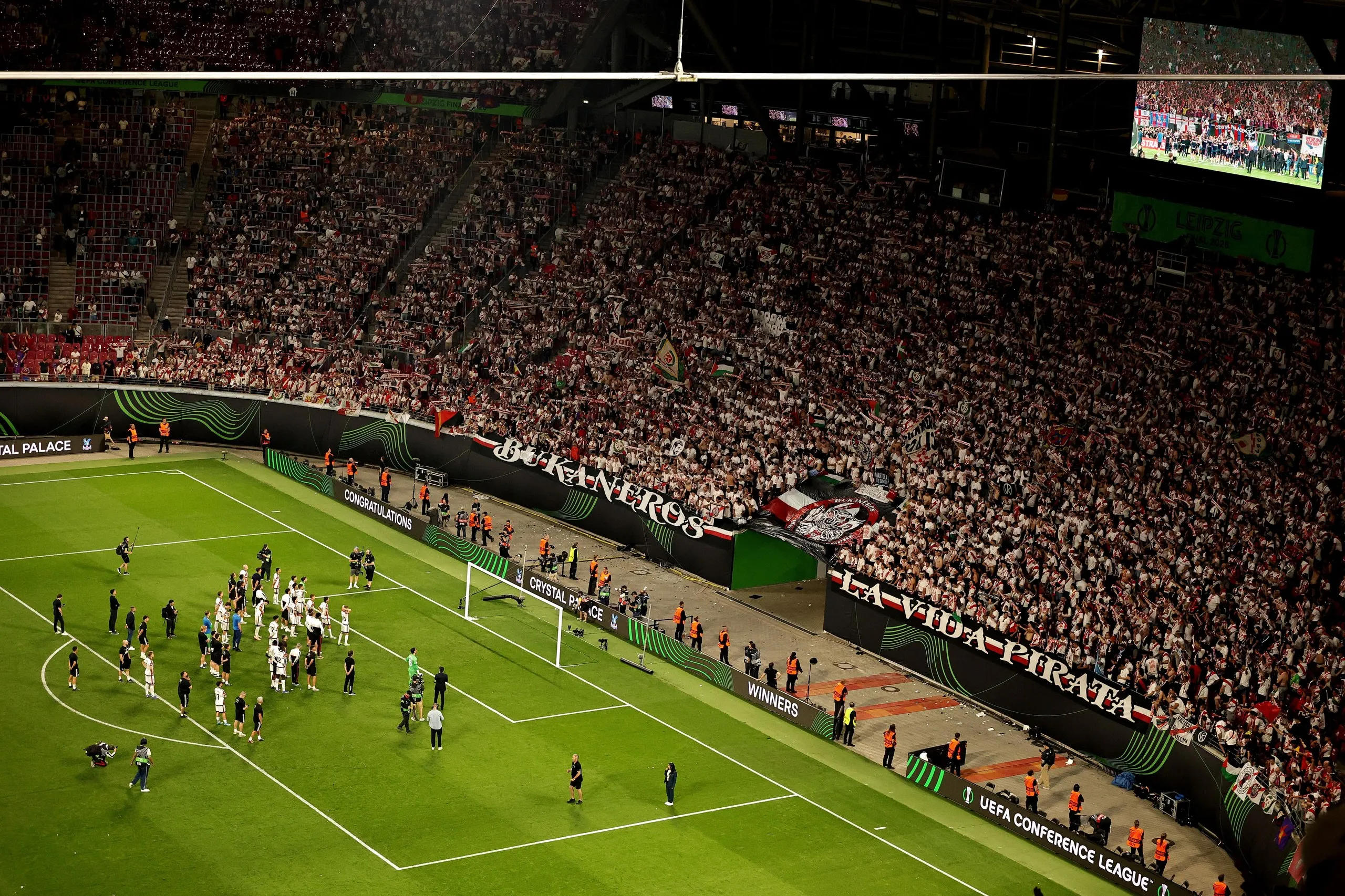 Players of Rayo Vallecano applaud their fans.