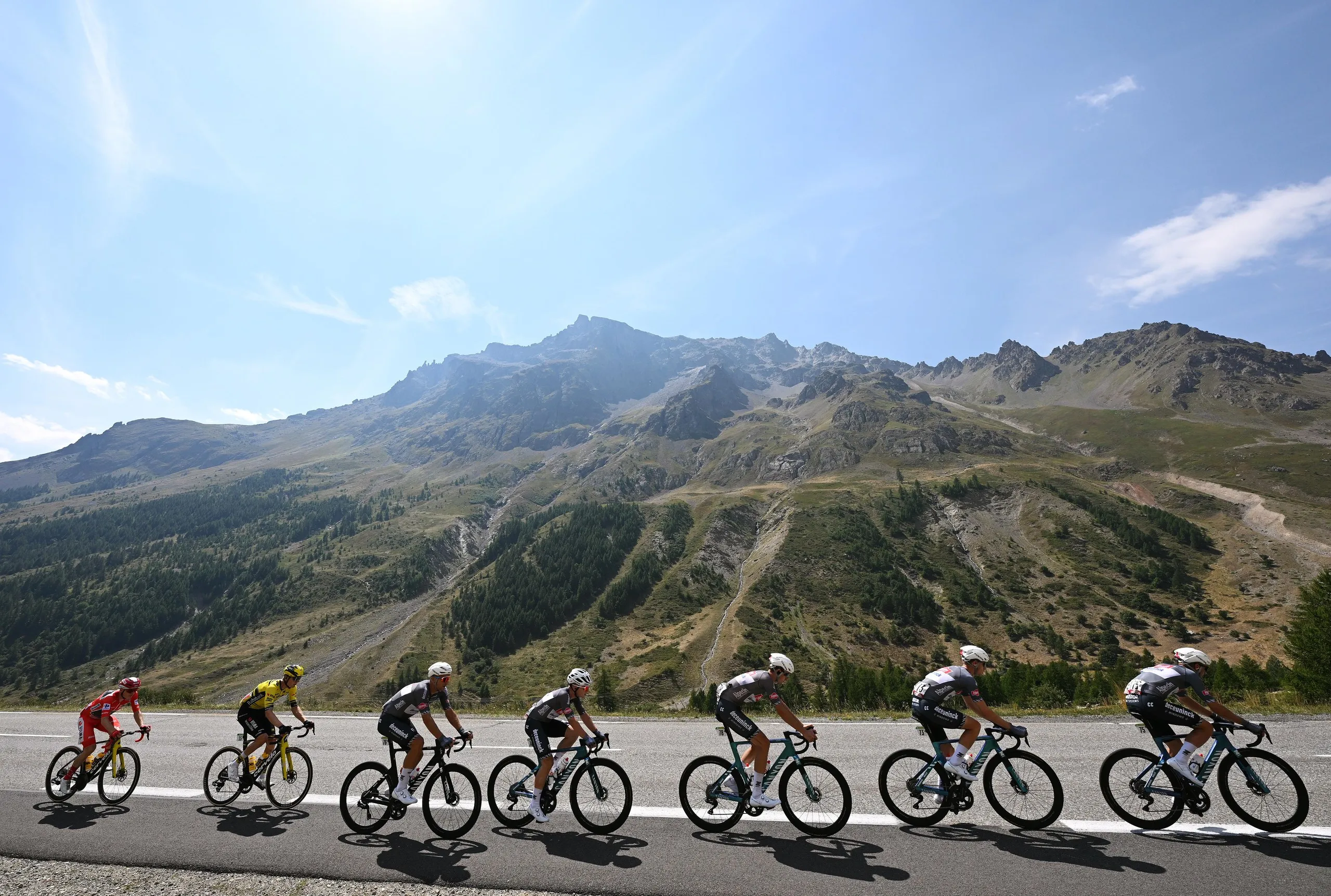 A group rides through the mountains during the 2025 Vuelta